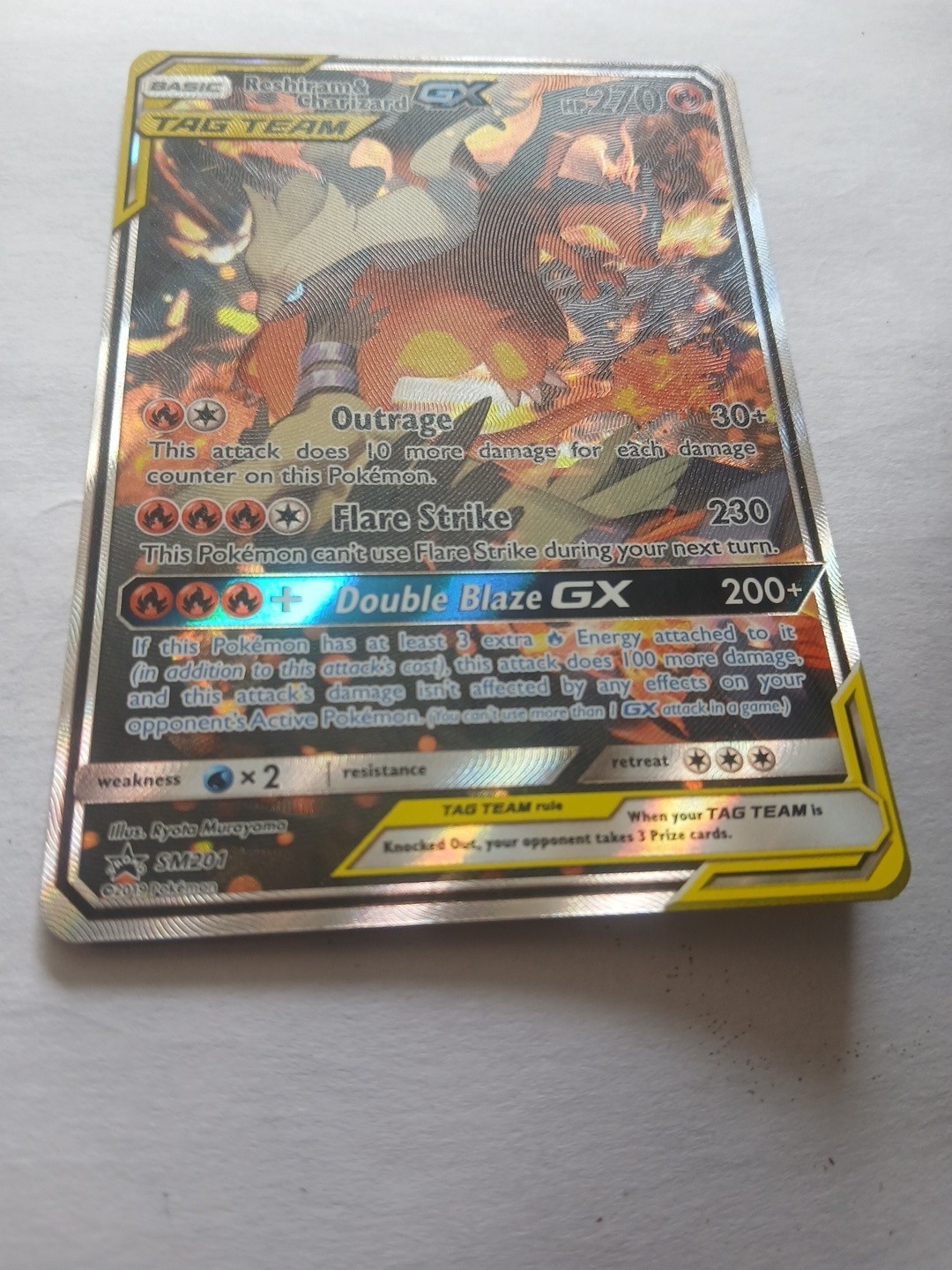 2019 Pokémon Sun Moon Black Promo Tag Team GX Reshiram Charizard #SM201