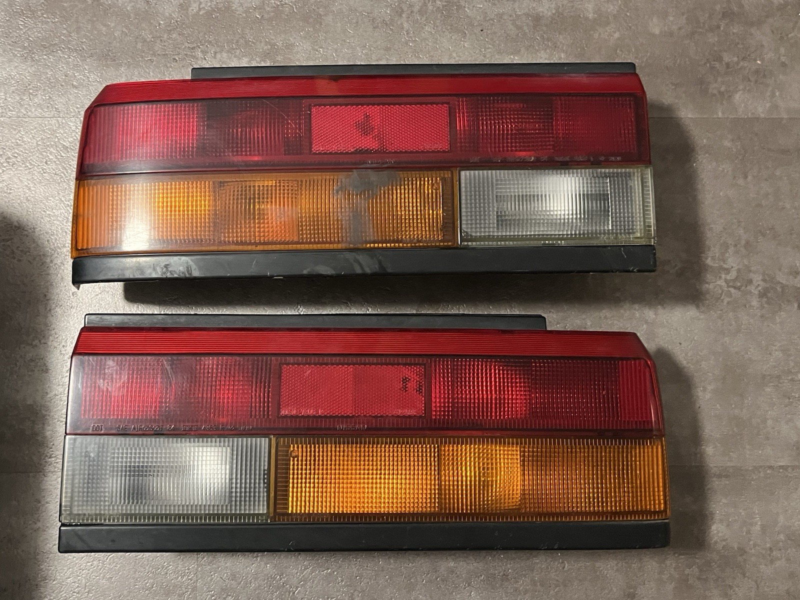VINTAGE 87-90 NISSAN SENTRA B12 TAIL LIGHT PAIR IKI 4363 GENUINE OEM USED VINTAGE 87-90 NISSAN SENTRA B12 TAIL LIGHT PAIR IKI 4363 GENUINE OEM USED
