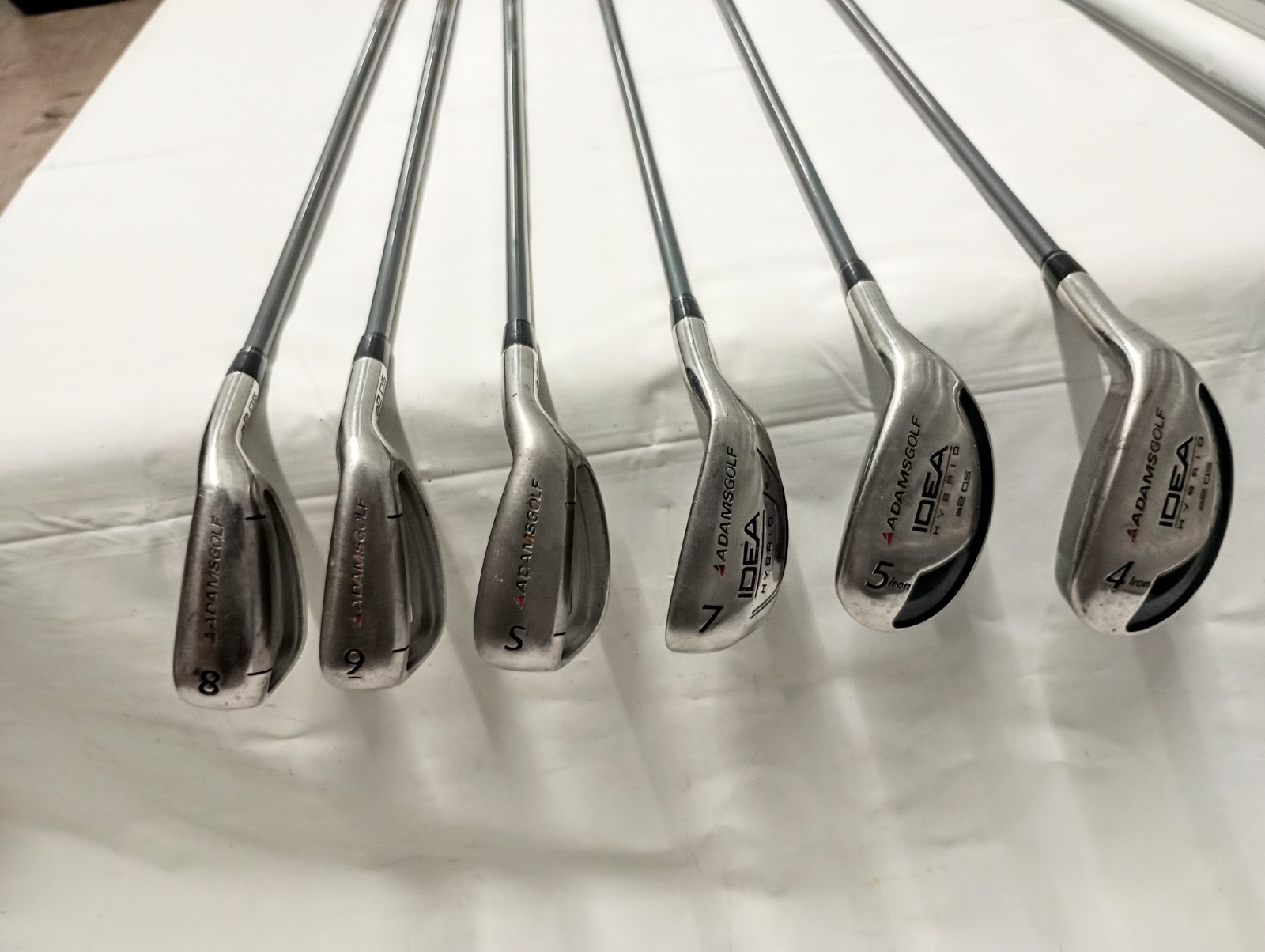 Adams Golf Idea A2OS 4 & 5 Hybrids , Irons 7, 8, 9, SW. Lite Flex Graphite RH. Adams Golf Idea A2OS 4 & 5 Hybrids , Irons 7, 8, 9, SW. Lite Flex Graphite RH.