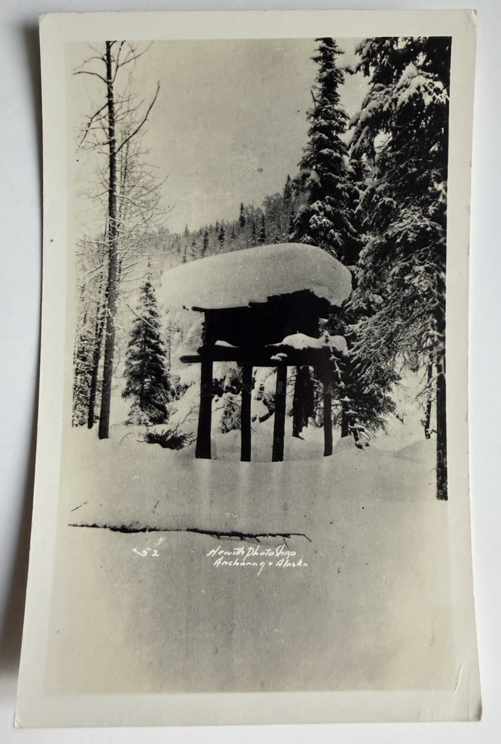 Vintage RPPC Anchorage Alaska Trapper Cache Elevated Hunting Cabin Postcard Snow