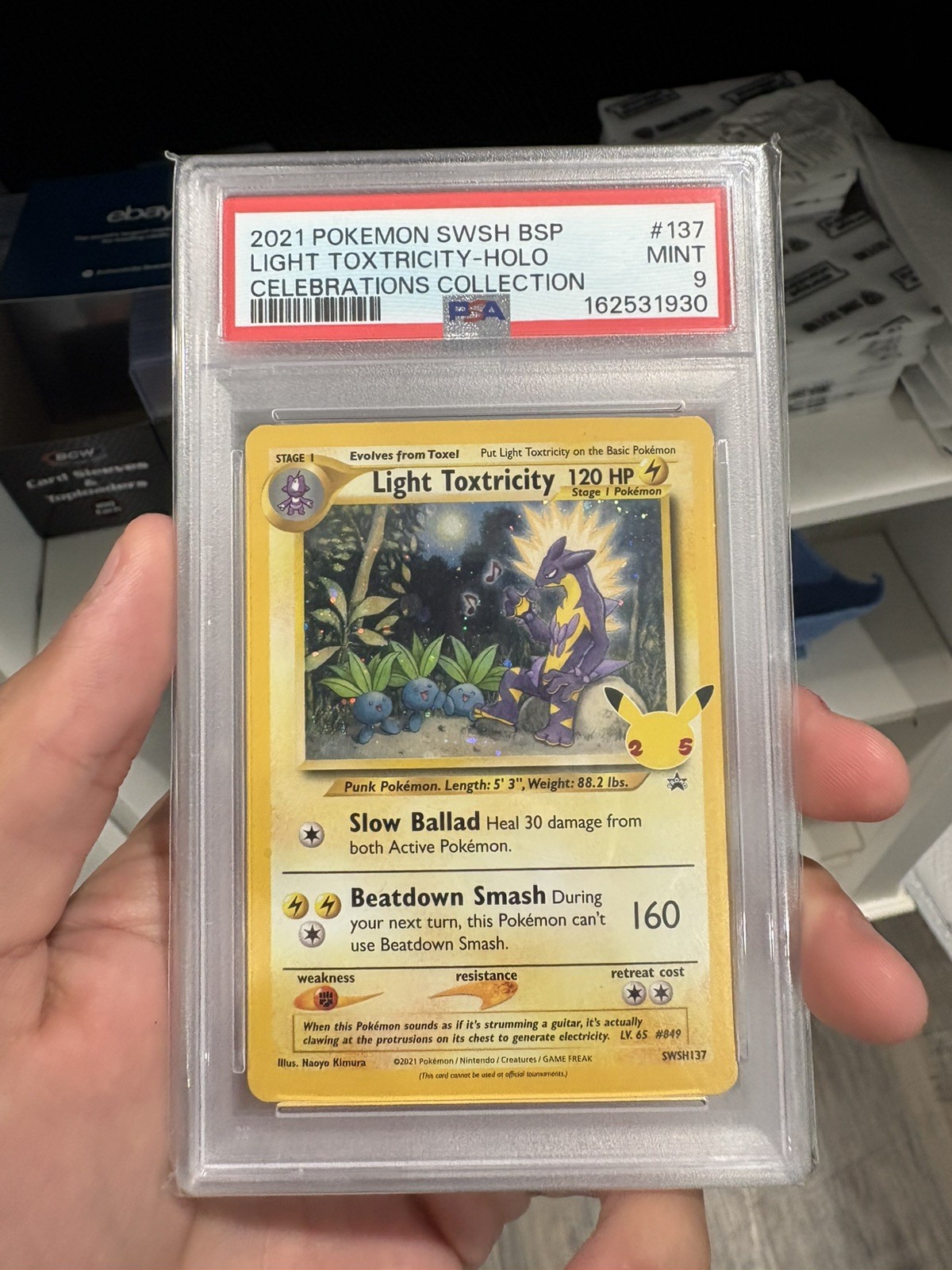 2021 POKEMON CELEBRATIONS LIGHT TOXTRICITY HOLO SWSH137 BLACK STAR PROMO PSA 9