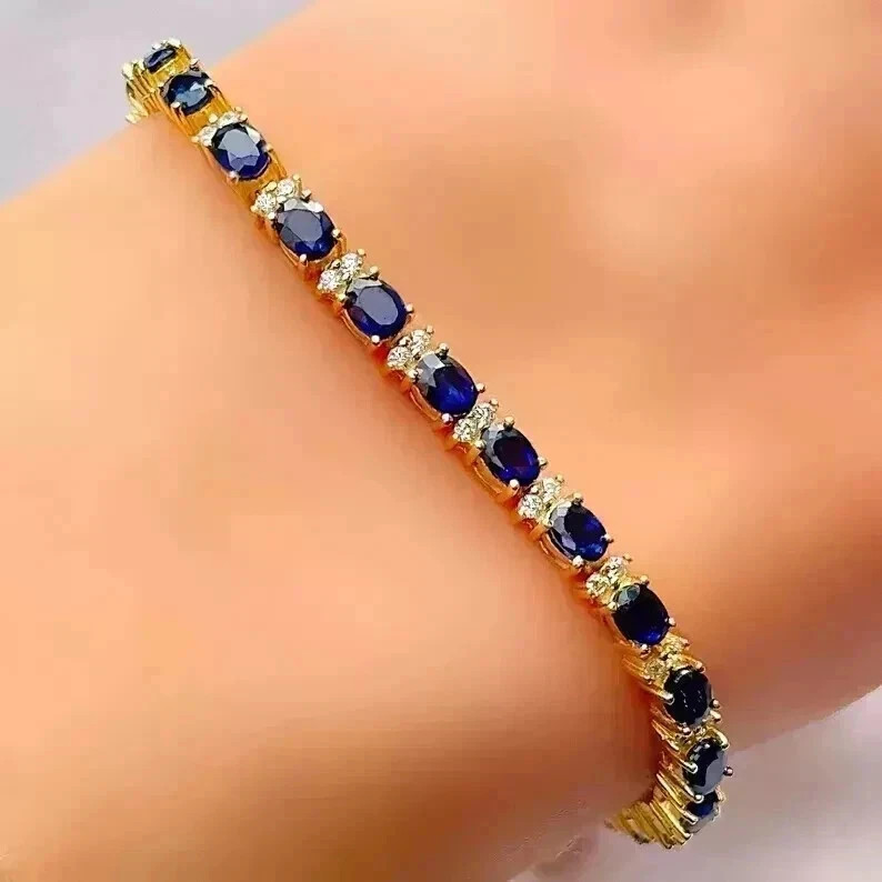 7Ct Oval Cut Lab-Created Blue Sapphire Tennis Bracelet 14K Yellow Gold Plated