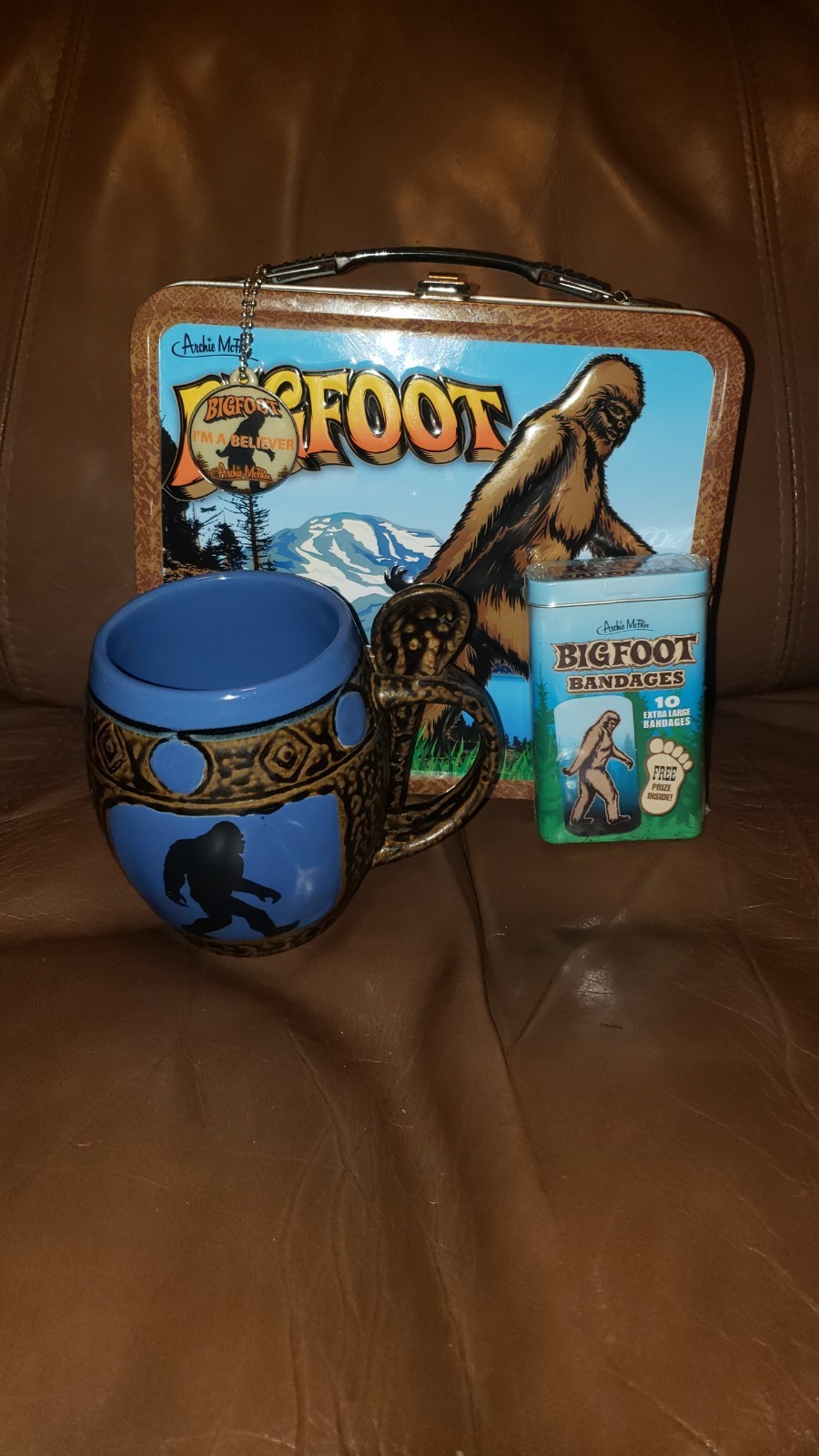 Bigfoot Lunchbox Lot with Mug, Spoon, Bandages, and Enamel Pin