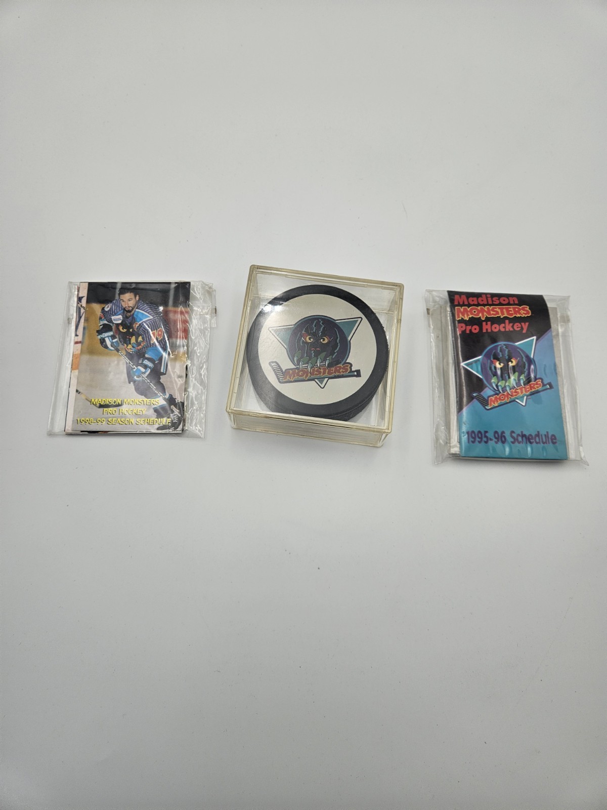 Vintage UHL Madison Monsters 1998-99 Hockey Puck With Case + 34 Cards & Schedule Vintage UHL Madison Monsters 1998-99 Hockey Puck With Case + 34 Cards & Schedule