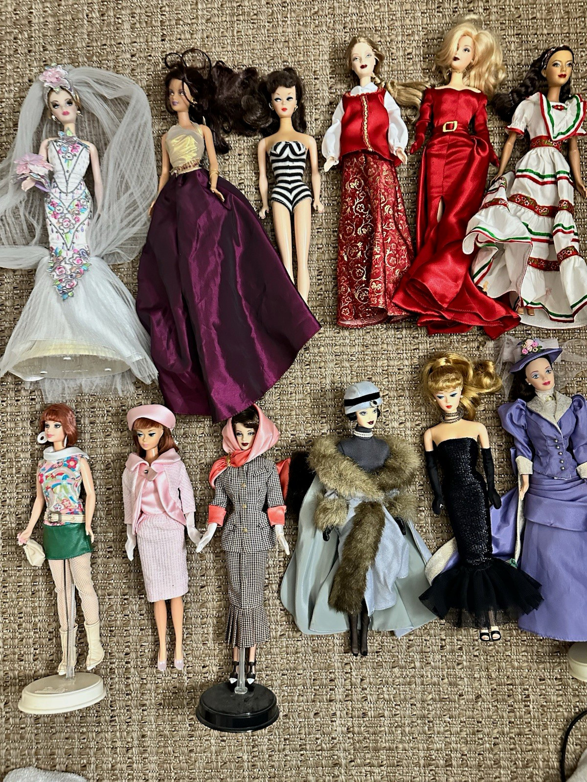 12 rare opened BARBIES. Some collectibles. Treated carefully. No boxes.