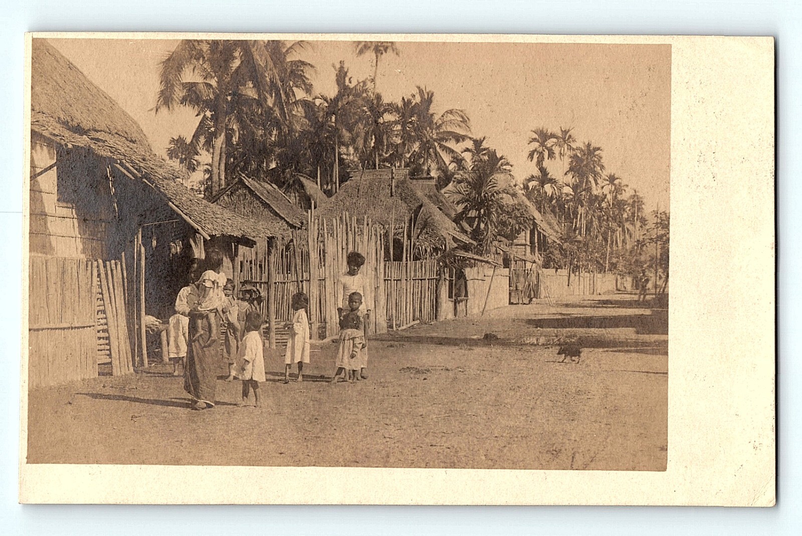 RPPC International Photo of Kids on Dirt Road Huts Fencing P Vintage Postcard D3 RPPC International Photo of Kids on Dirt Road Huts Fencing P Vintage Postcard D3