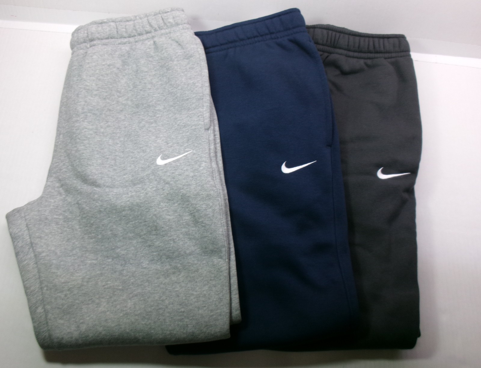 Nike Fleece jogger leg athletic pants Ribbed Cuff Drawstring 3 pockets 1 w Snap