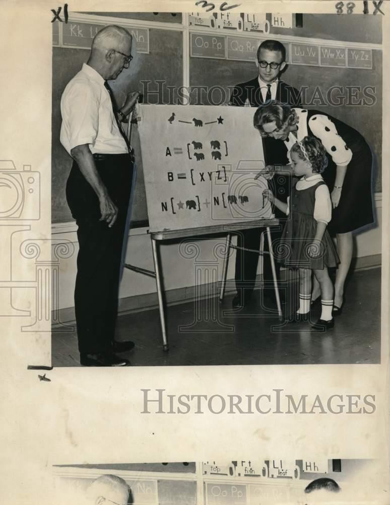 1964 Press Photo St. Paul First English Lutheran educators with student Paretti.