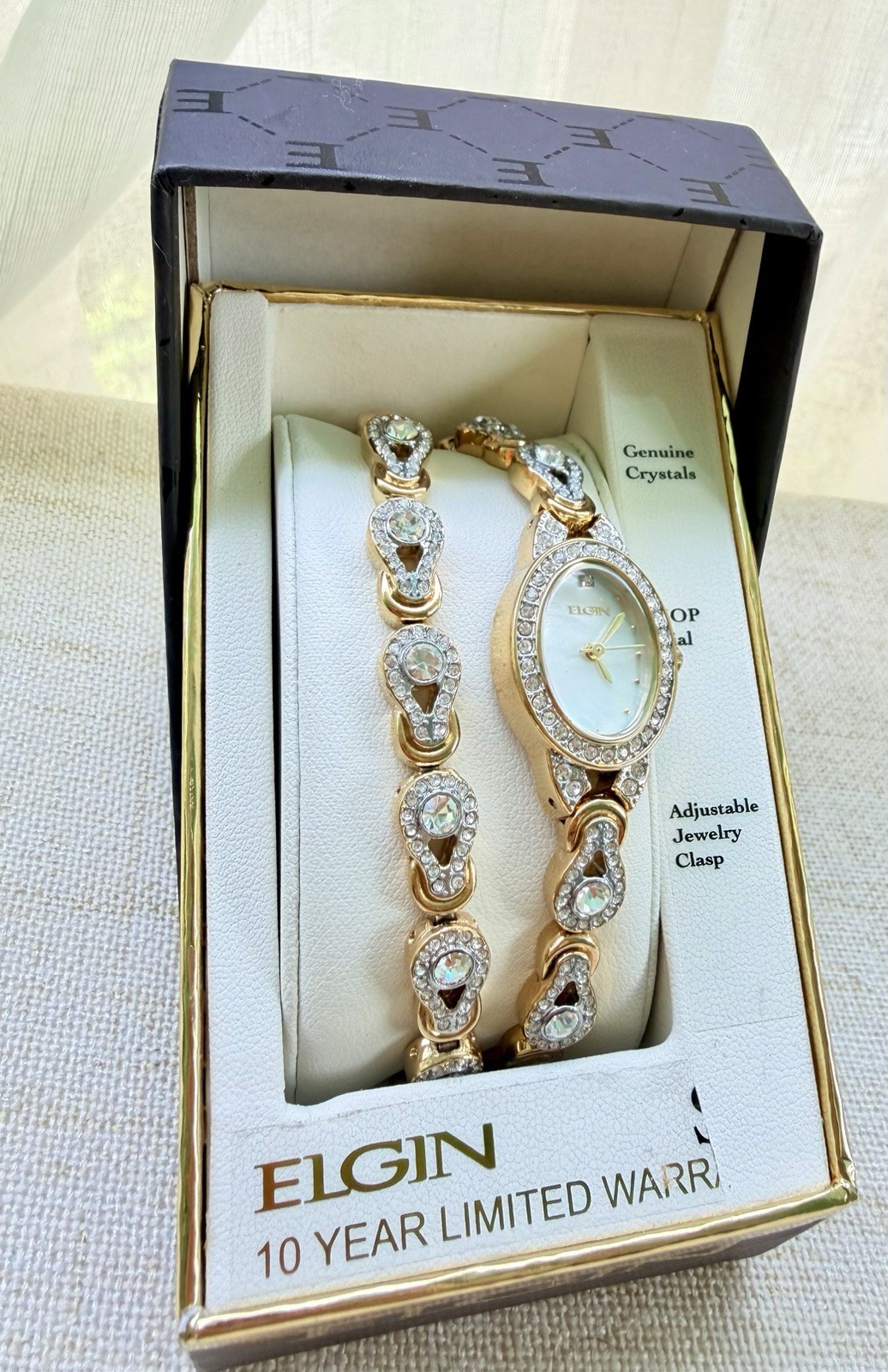 Elgin Women’s Gold Tone Quartz Bracelet Watch Oval MOP Dial Box