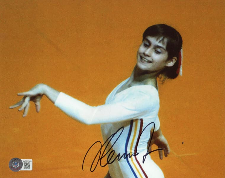 NADIA COMANECI SIGNED 8x10 PHOTO OLYMPIC GYMNASTICS LEGEND ICON HERO BECKETT BAS