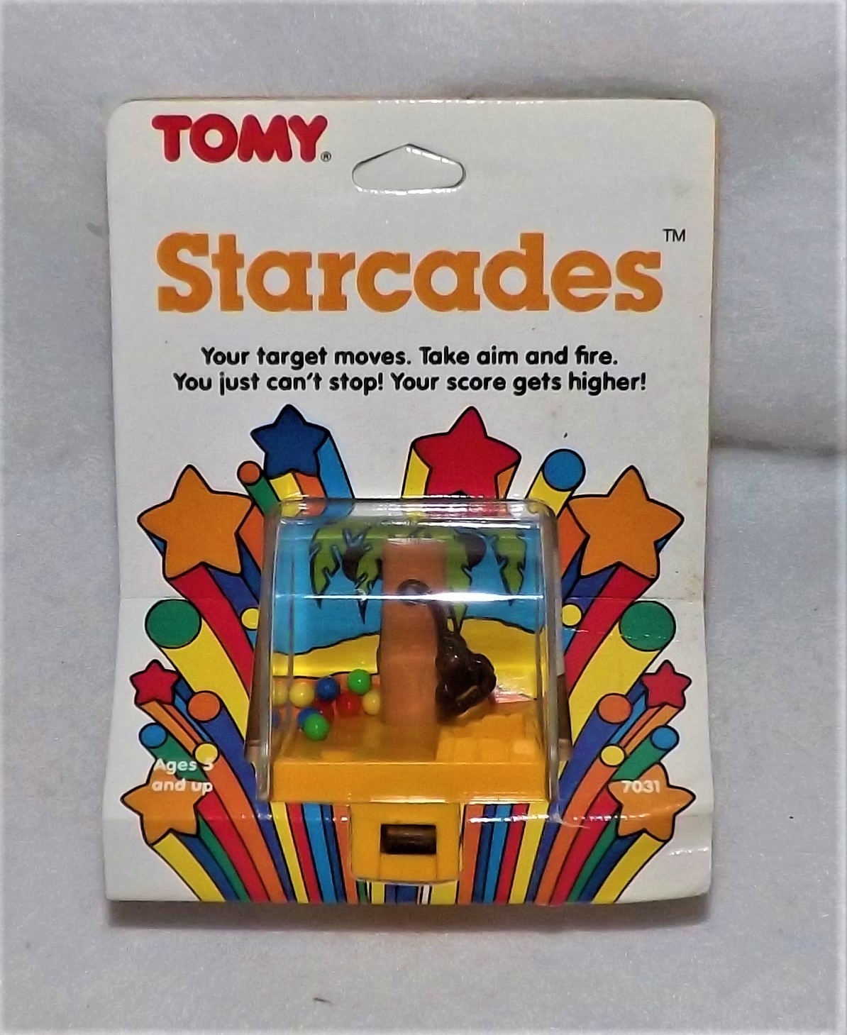 TOMY STARCADES VINTAGE WINDUP \