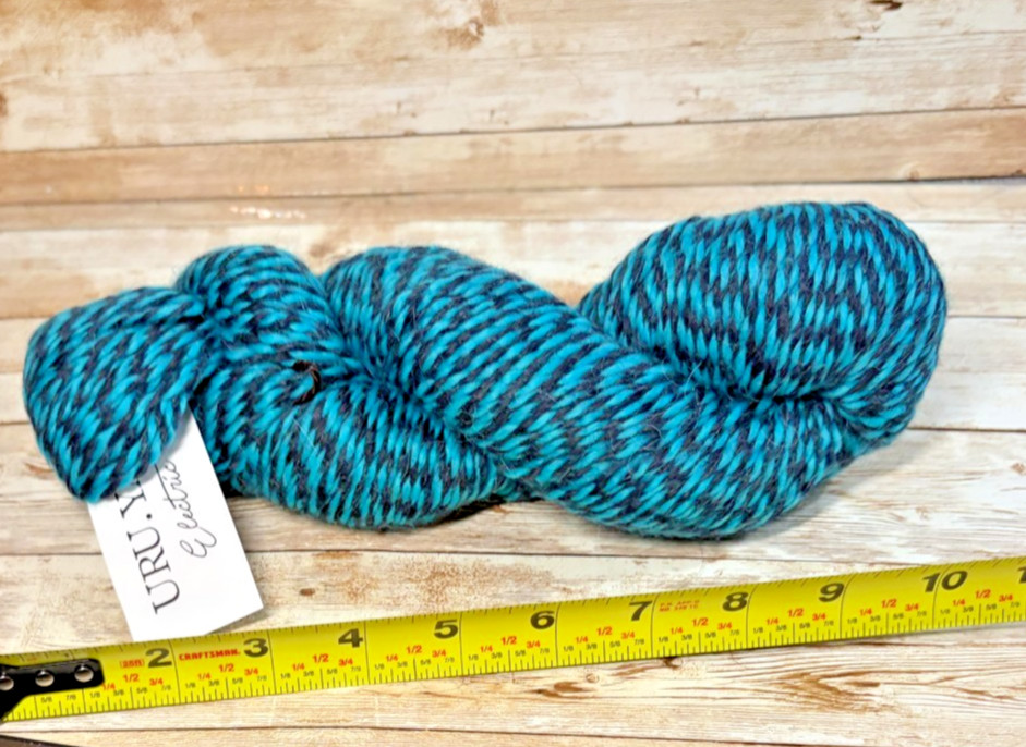 One (1) Hank URU . Yarn by Knitcrate Color: RAVE Lot: 281766