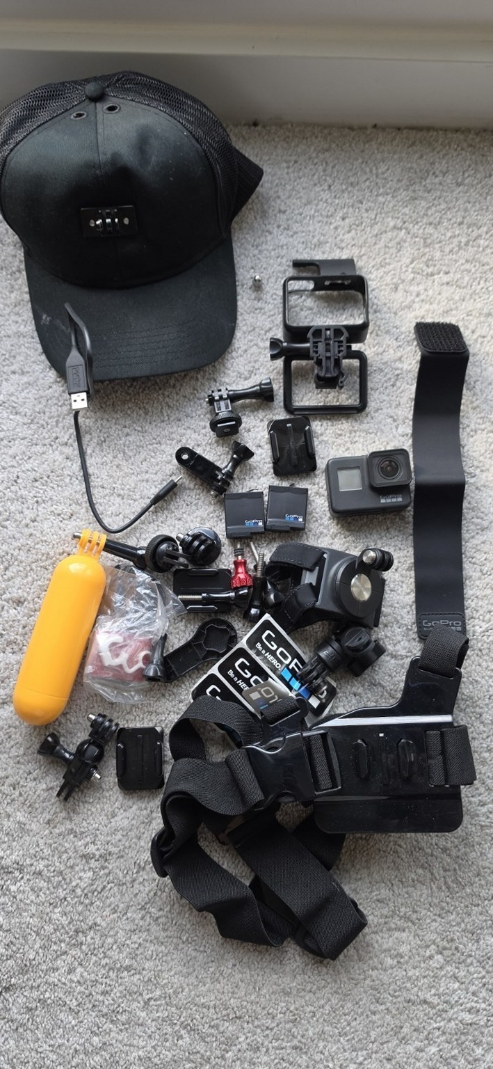 GoPro HERO7 Black Waterproof Action Camera with Helmet Mount Accessory Kit -Used