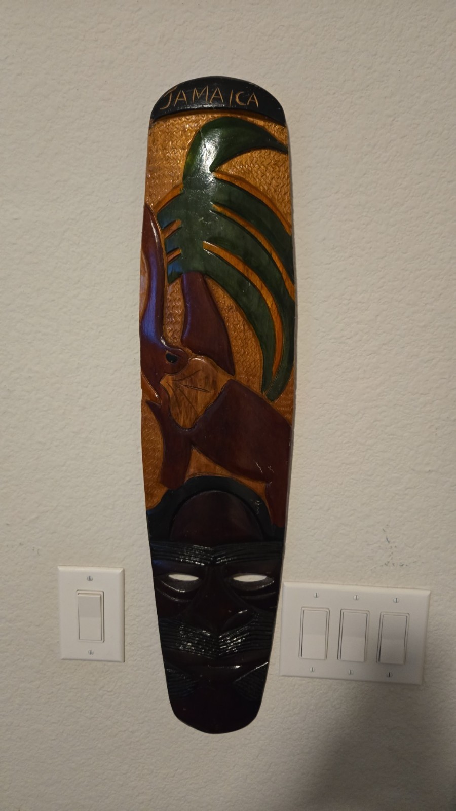 vintage, hand-carved, and painted wooden wall mask from Jamaica vintage, hand-carved, and painted wooden wall mask from Jamaica