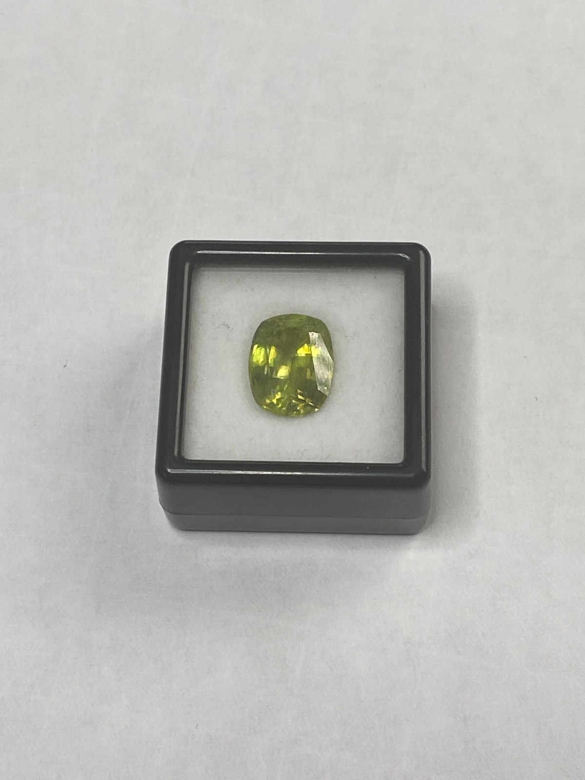 4.59ct Yellow/Green Sphene Cushion Cut Madagascar with Certificate 4.59ct Yellow/Green Sphene Cushion Cut Madagascar with Certificate