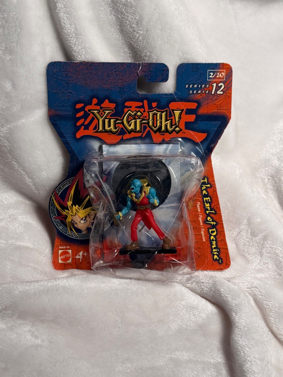 Six sealed, vintage Mattel Yu-Gi-Oh mini figures with holo-tiles