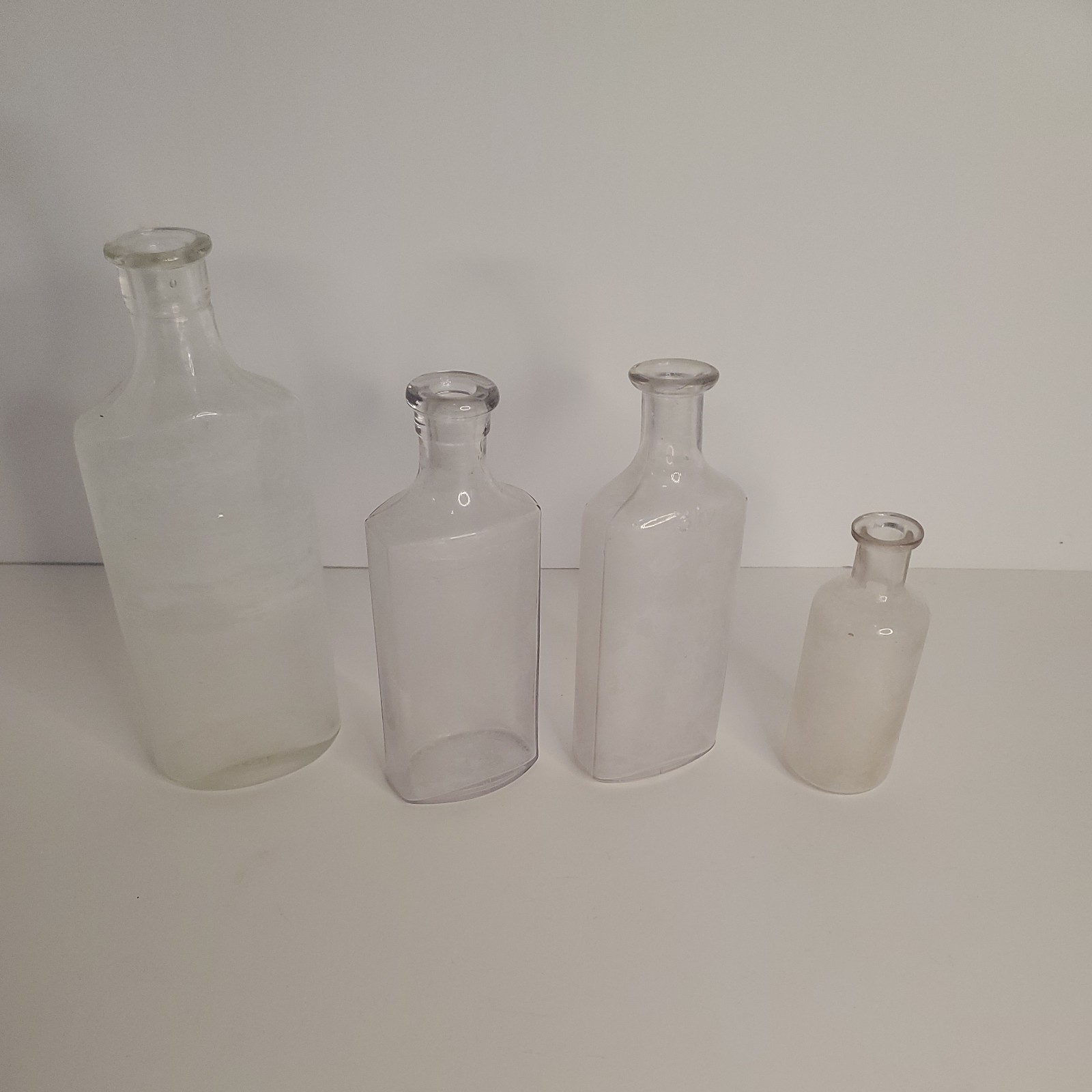 4 ANTIQUE Glass handblown Apothecary Bottles. RX Medicine PHARMACEUTICAL 4 ANTIQUE Glass handblown Apothecary Bottles. RX Medicine PHARMACEUTICAL