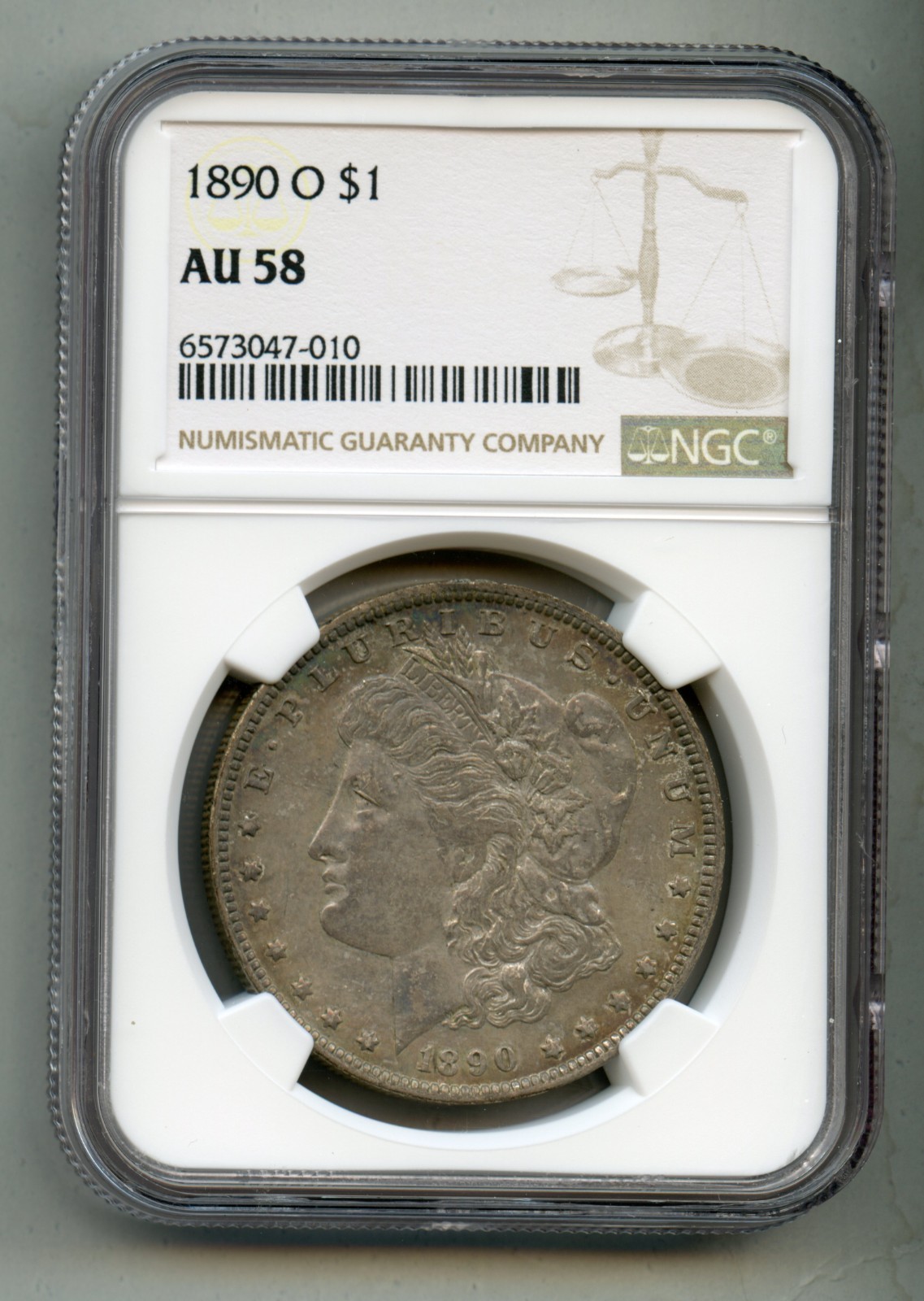 1890 O Morgan Silver Dollar NGC AU 58