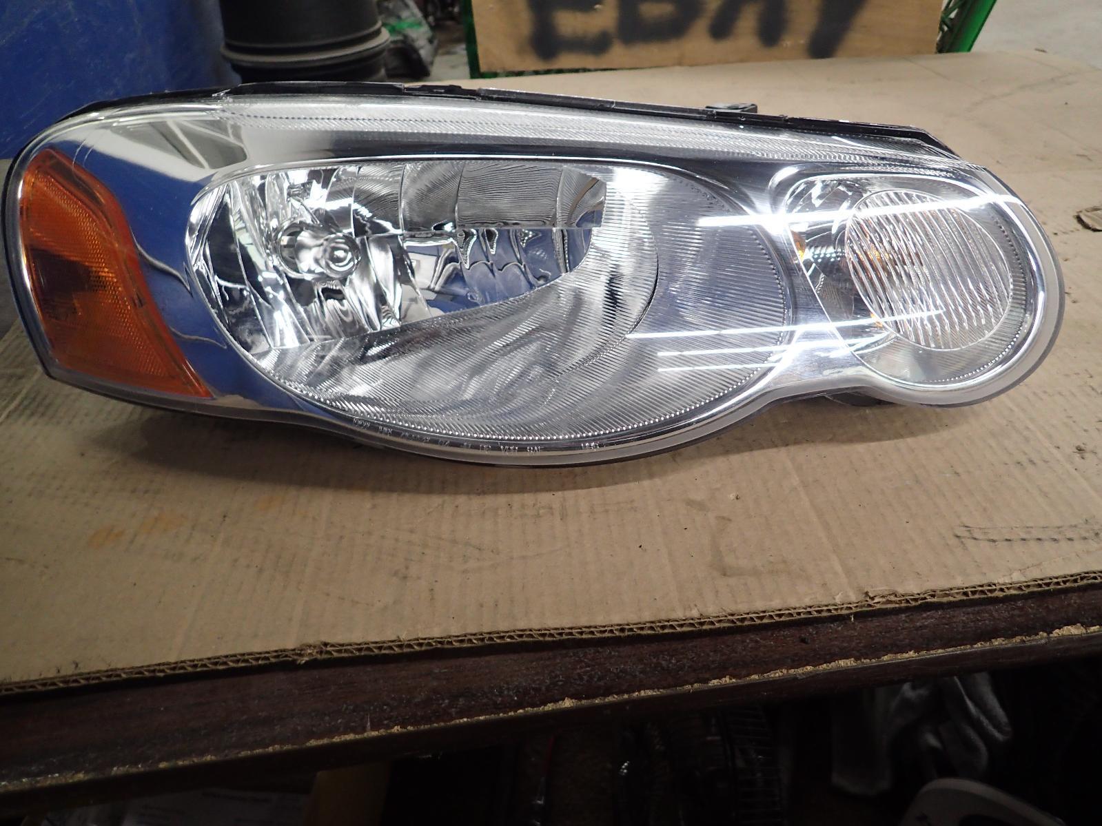 06 SEBRING: Aftermarket Right Valeo Sylvania Headlight