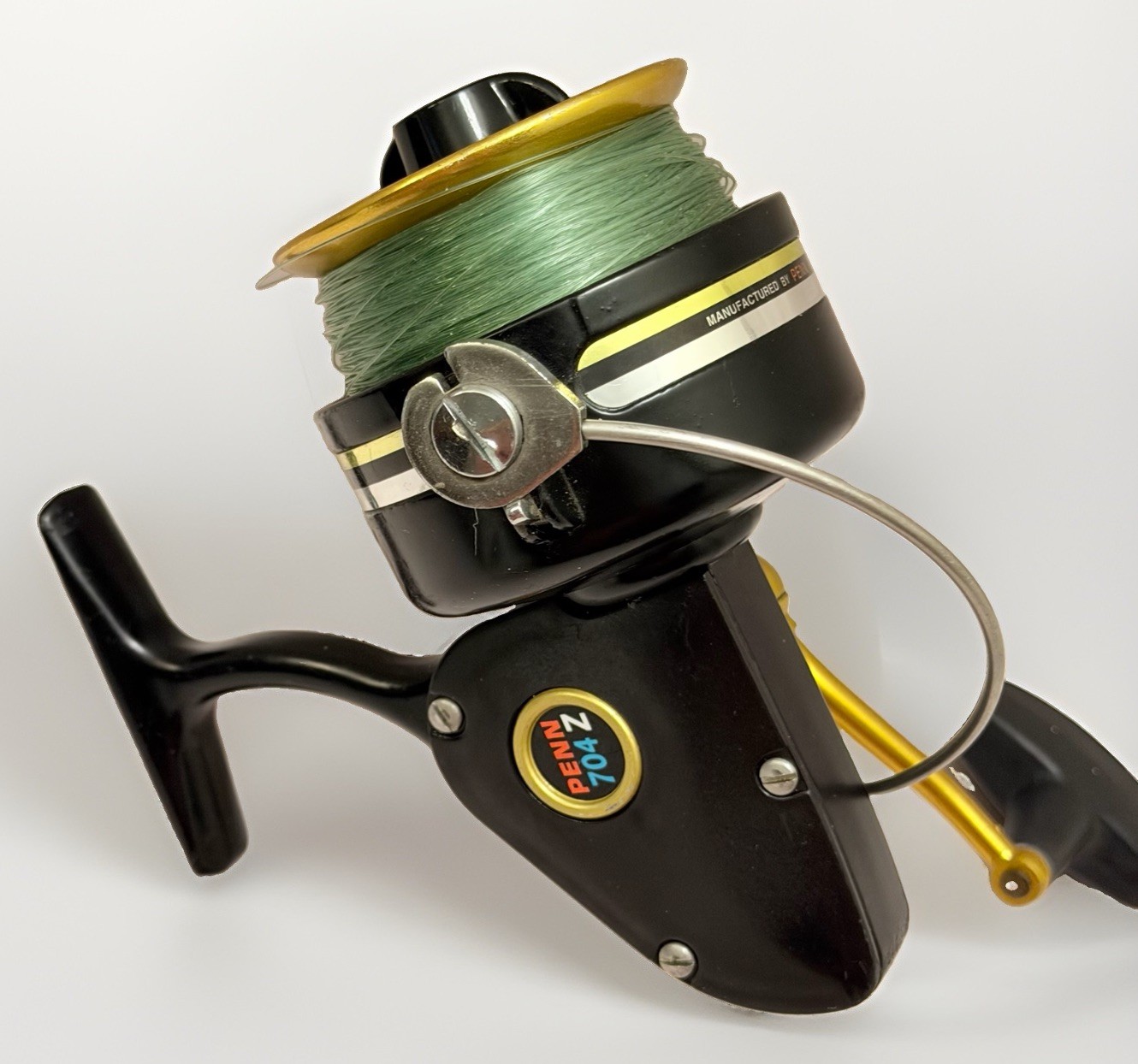 Penn 704 Z Spinning Reel Fishing Black Gold READ Needs Bail Replacement USA VTG
