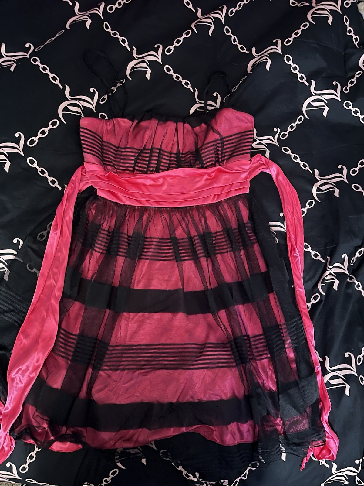 My Michelle Pink and black sheer lace mini dress with pink tie accent on back My Michelle Pink and black sheer lace mini dress with pink tie accent on back
