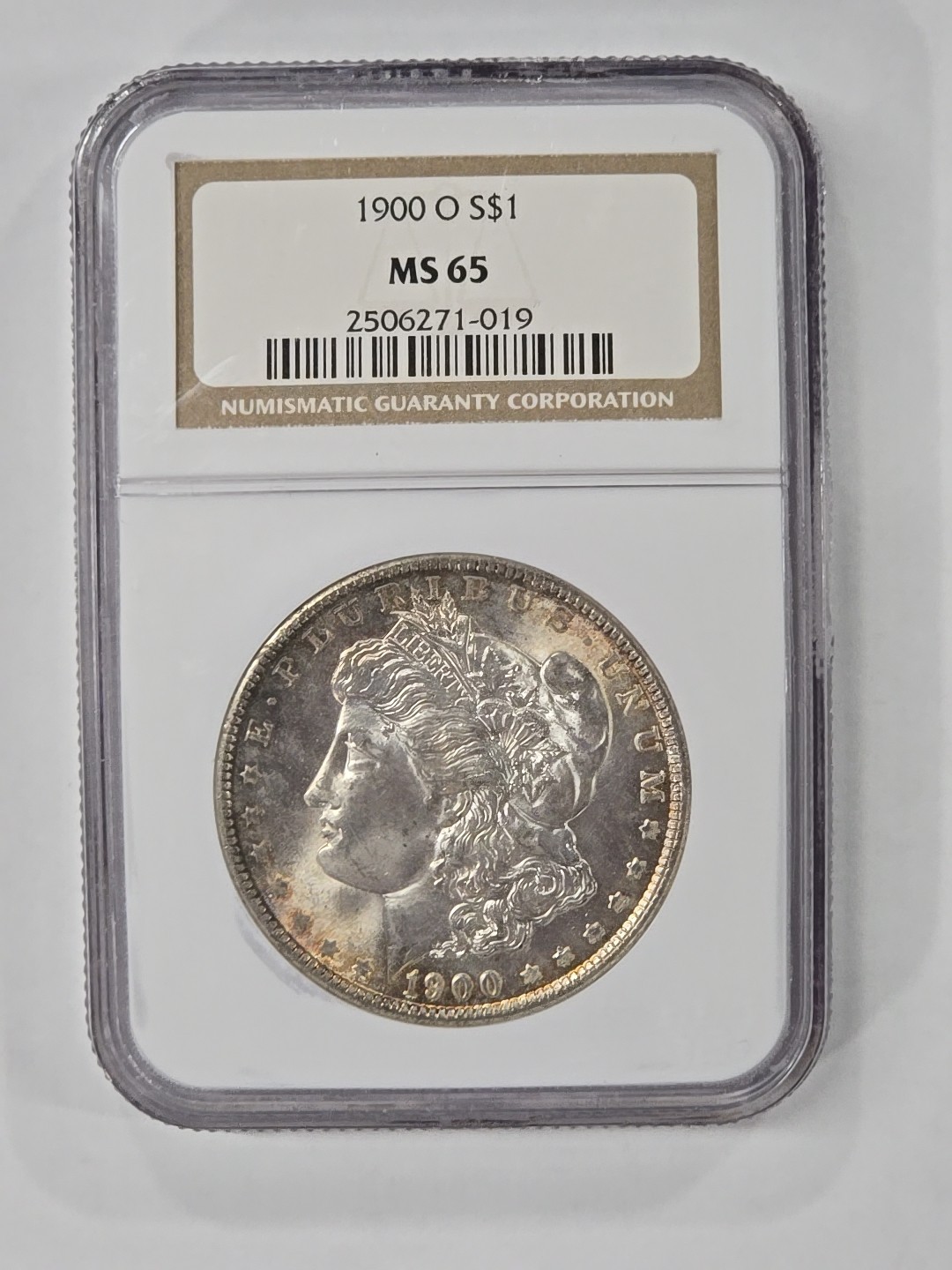 1900-O $1 Morgan Silver Dollar - Nice Toning - NGC MS 65 - #1577 1900-O $1 Morgan Silver Dollar - Nice Toning - NGC MS 65 - #1577