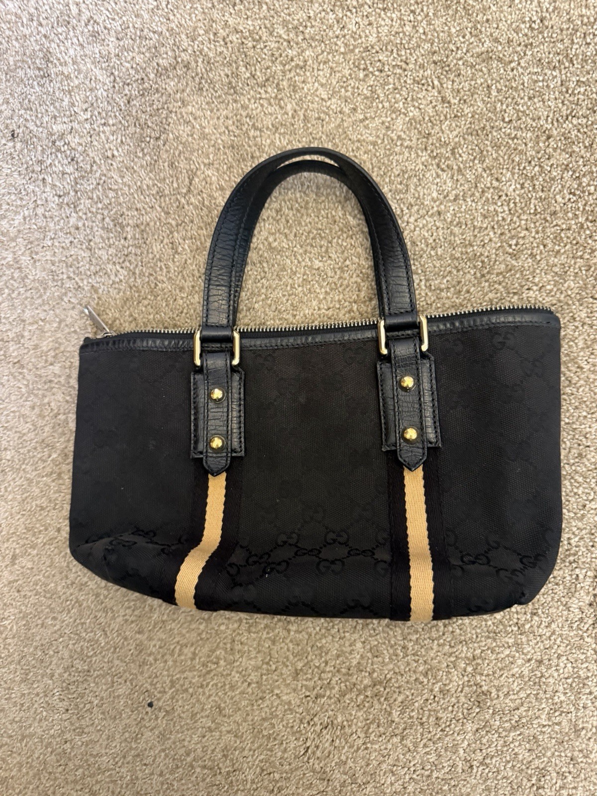 Gucci Black GG Top Handle Bag Zip Closure Gold Hardware Inner Pockets