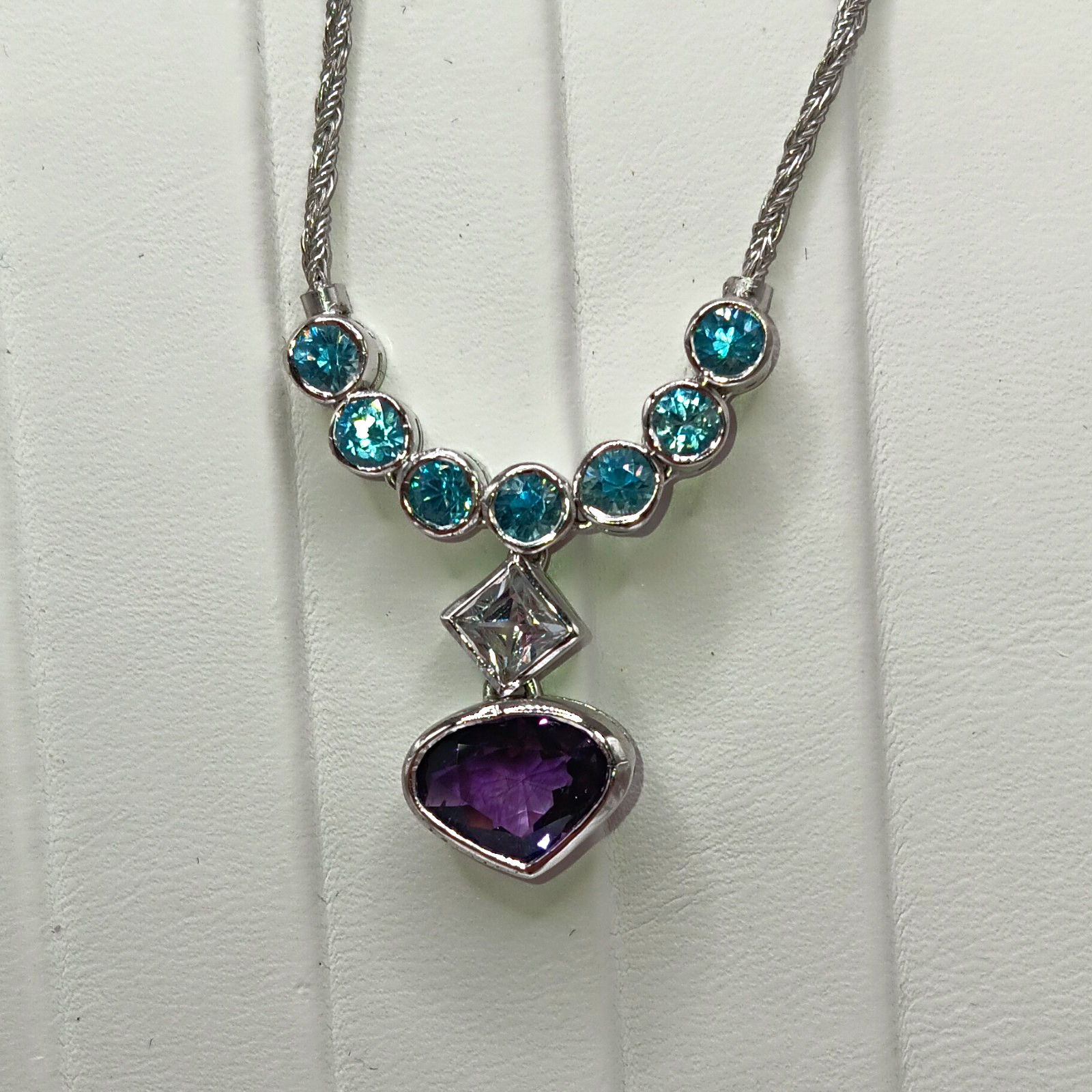 925 Sterling Silver Amethyst Blue and White ZirconNecklace 6.37ct. 6.41 Grams 925 Sterling Silver Amethyst Blue and White ZirconNecklace 6.37ct. 6.41 Grams