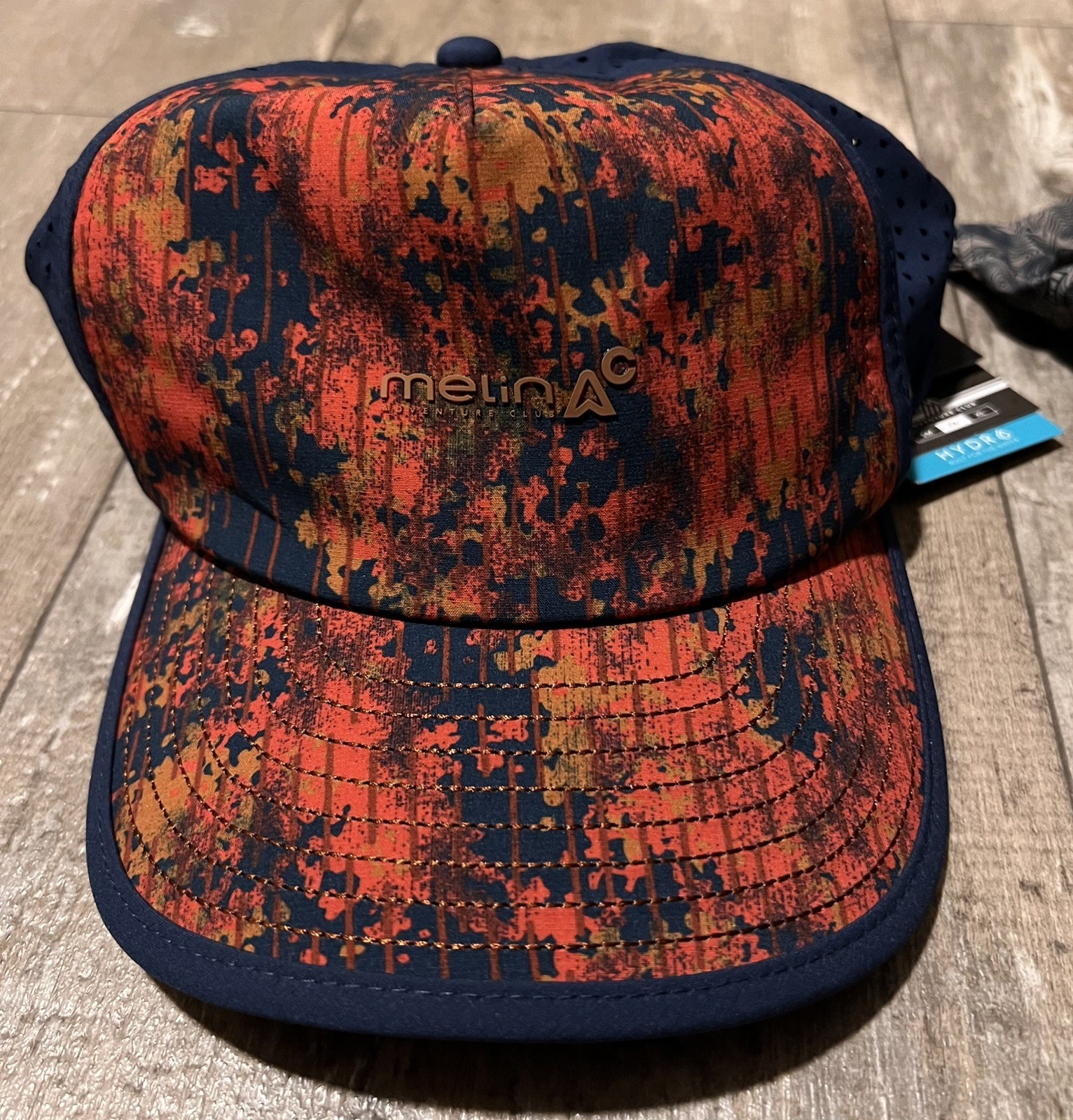 MELIN - ODYSEA PACKABLE HYDRO- adventure club - classic Rain Camo pattern- NWT