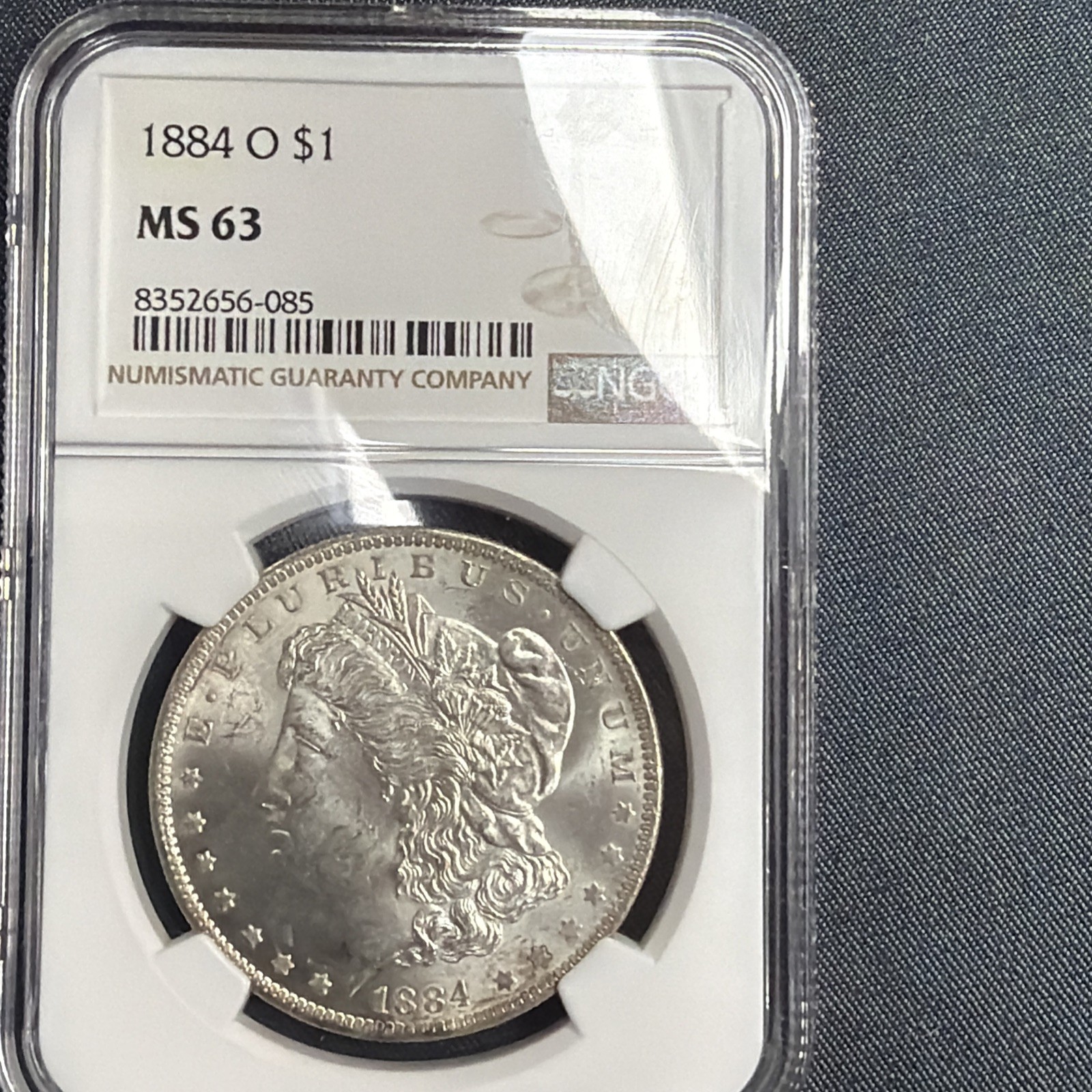 1884-O Morgan Dollar MS63 NGC - 1884-O Morgan Dollar MS63 NGC -