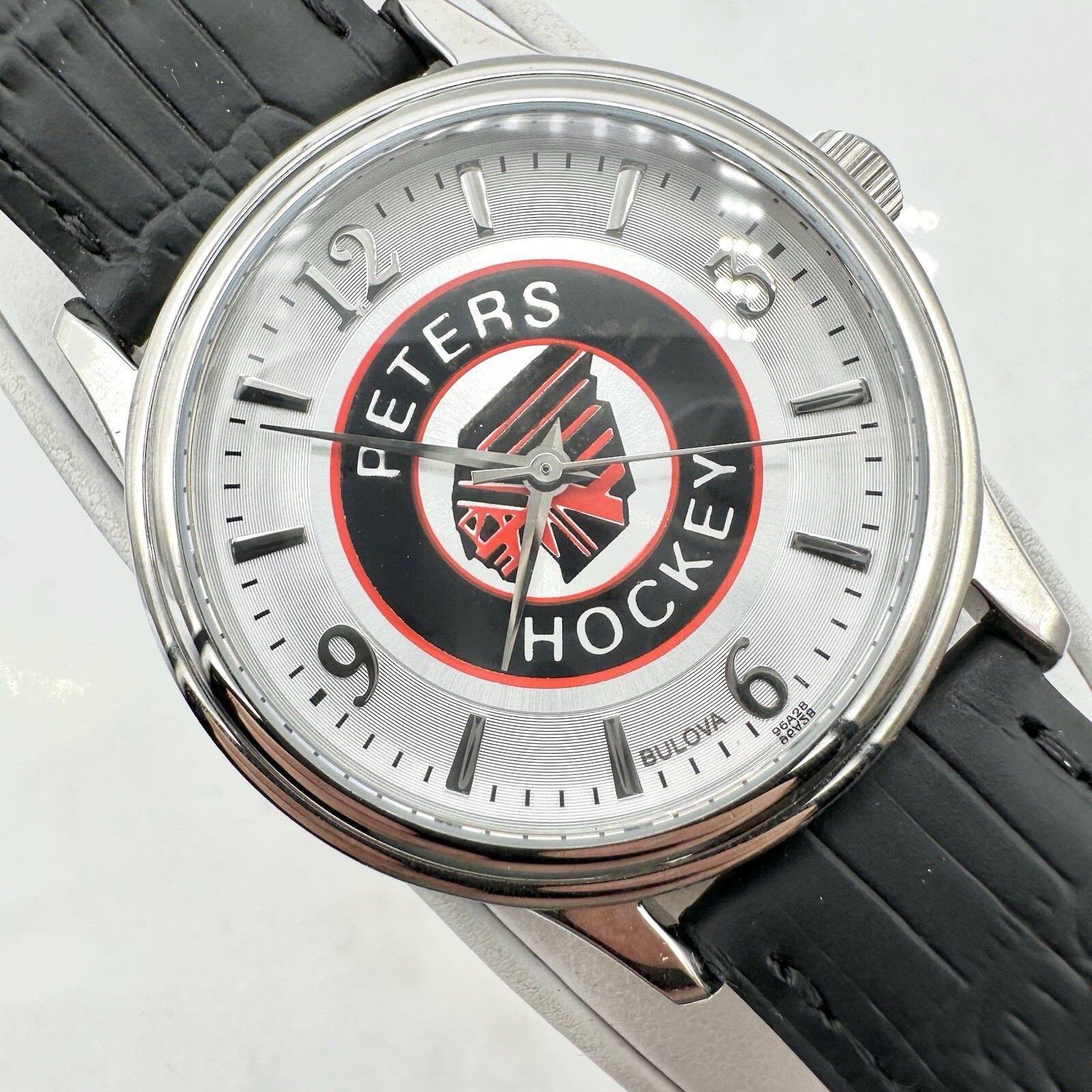 NWT - Bulova Men\'s Watch 96A28 “Peter’s Hockey” Silver Dial Black Leather 38mm