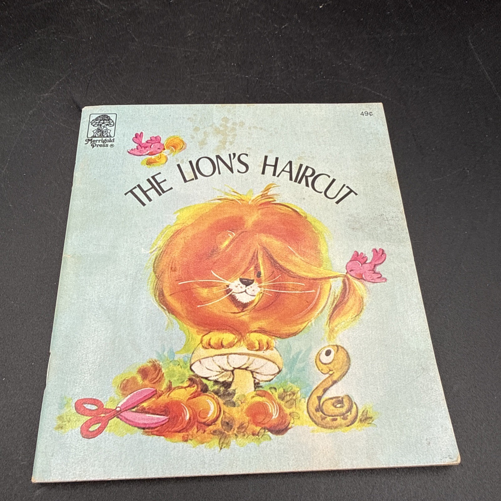 Vintage children\'s book titled \'The Lion\'s Haircut\' by Jennifer Giddings Vintage children\'s book titled \'The Lion\'s Haircut\' by Jennifer Giddings