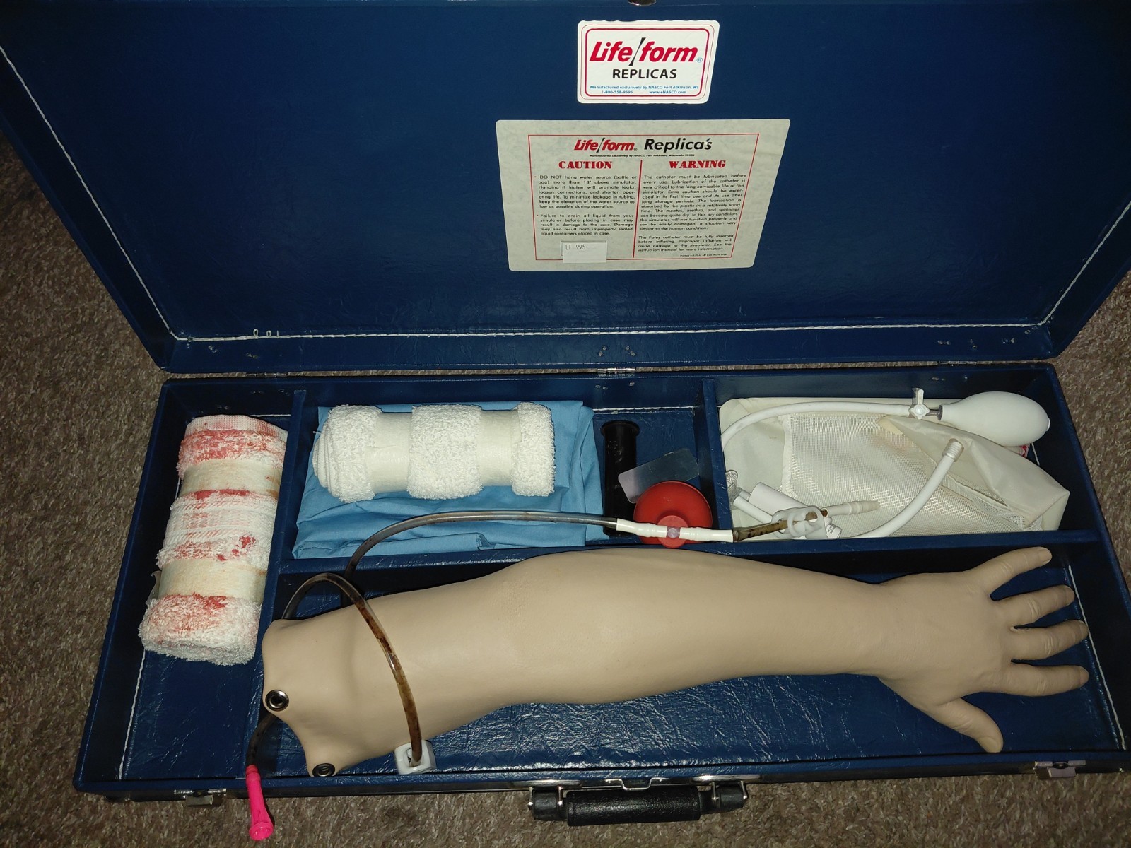 Nasco LifeForm® Arterial Puncture Arm LF995-5400 Medical Simulator With Case Nasco LifeForm® Arterial Puncture Arm LF995-5400 Medical Simulator With Case