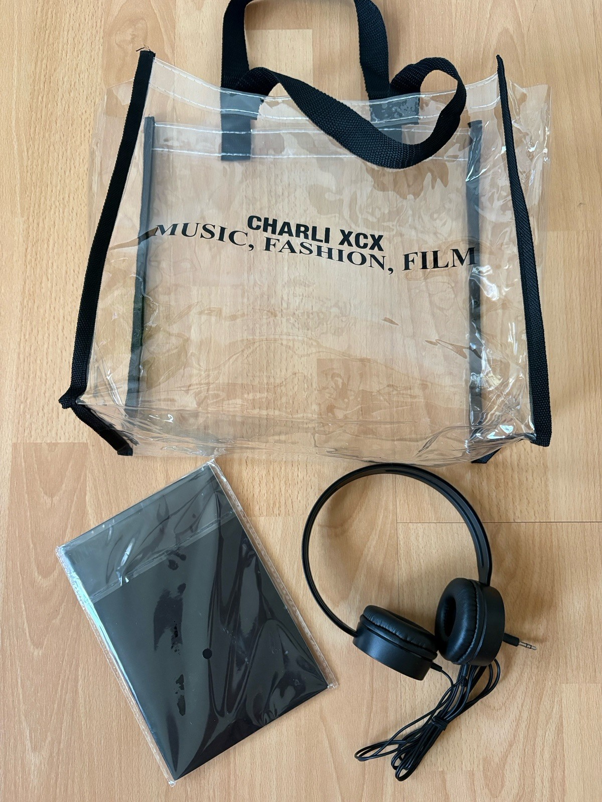Charli XCX music fashion film VIP merch - clear tote bag, headphones notebook Charli XCX music fashion film VIP merch - clear tote bag, headphones notebook