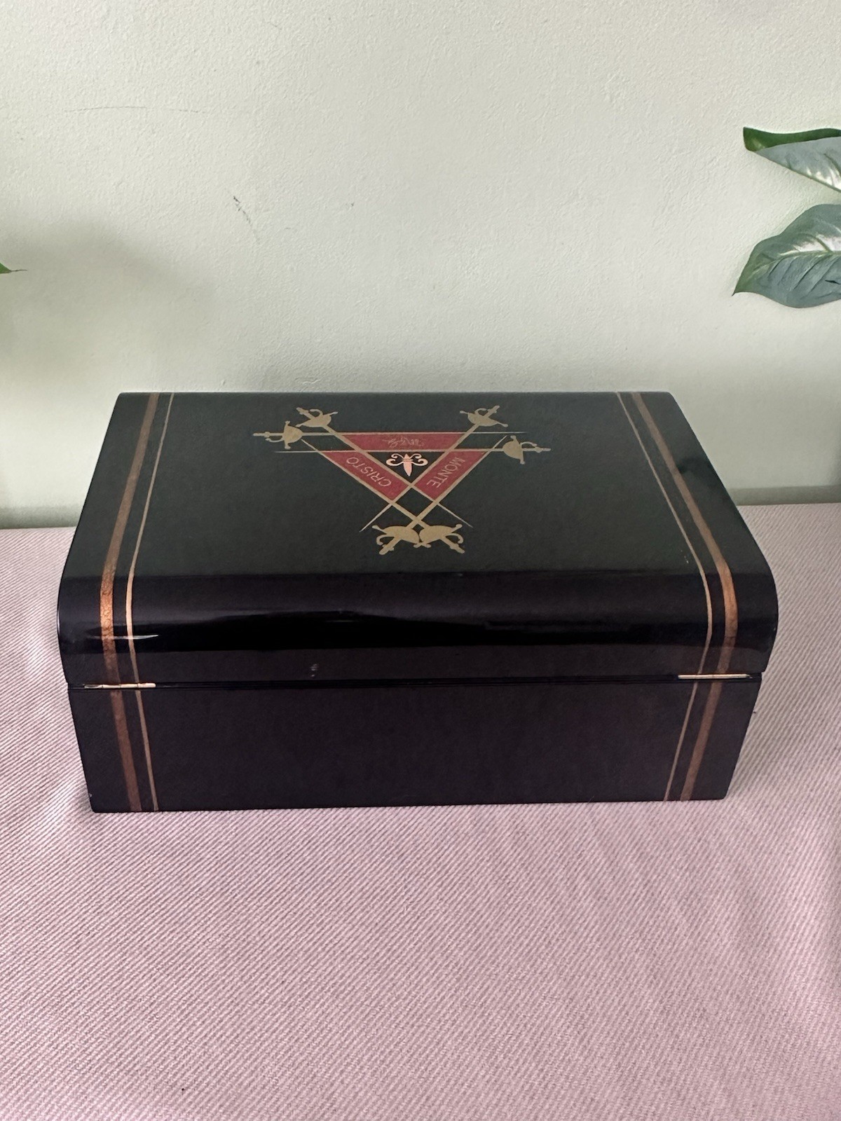 This piece is a Montecristo desktop cigar humidifier