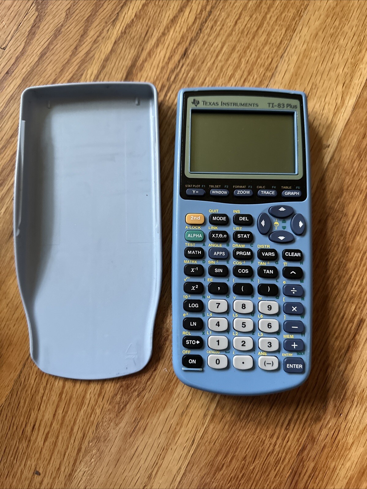 Texas Instruments TI-83 Plus Graphing Calculator Periwinkle Light Blue W/ Cover Texas Instruments TI-83 Plus Graphing Calculator Periwinkle Light Blue W/ Cover