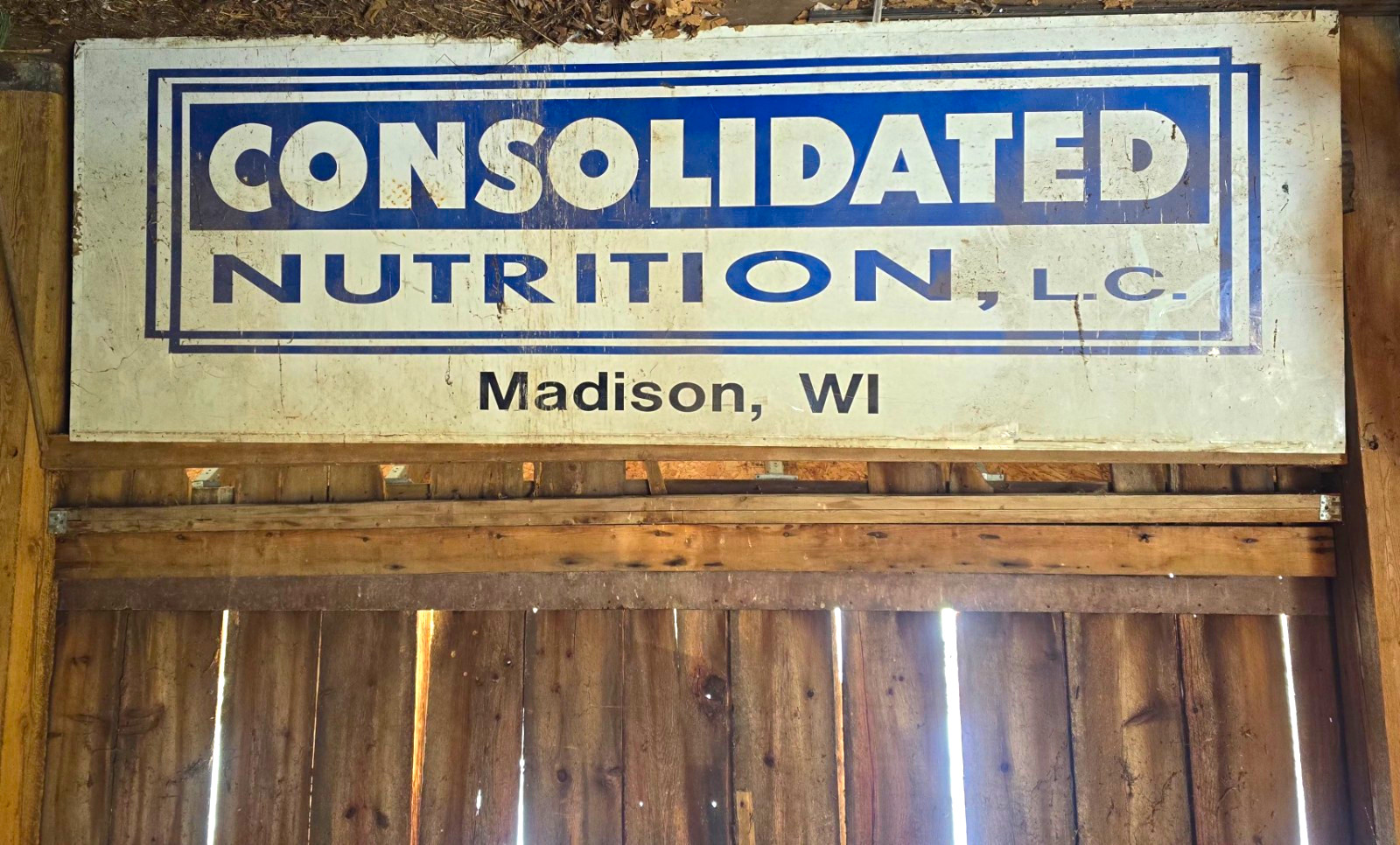 Consolidated Nutrition, L.C. Madison WI Blue & White Advertising Sign