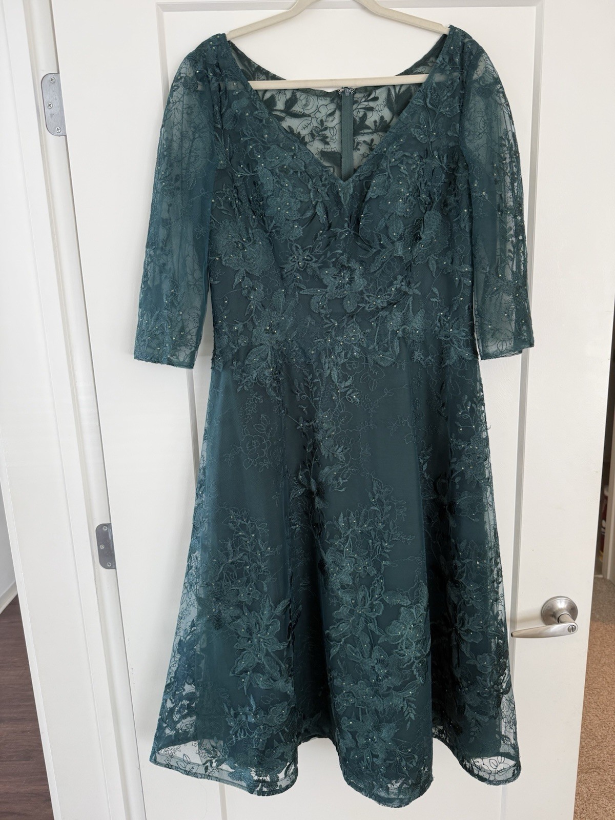 La Femme Tea Length Mother of the Bride Dress with Three-Quarter Sleeves La Femme Tea Length Mother of the Bride Dress with Three-Quarter Sleeves