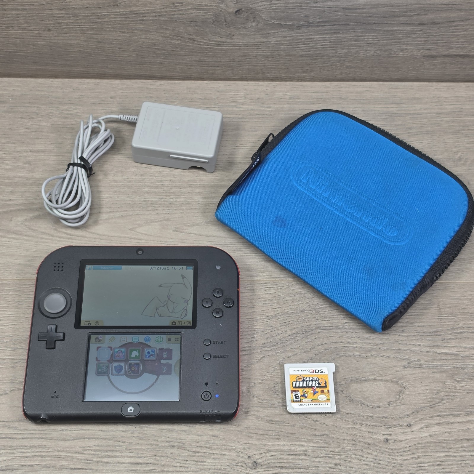 Nintendo 2DS Console - Black / Red (No Stylus) w/ Charger - Tested & Working Nintendo 2DS Console - Black / Red (No Stylus) w/ Charger - Tested & Working