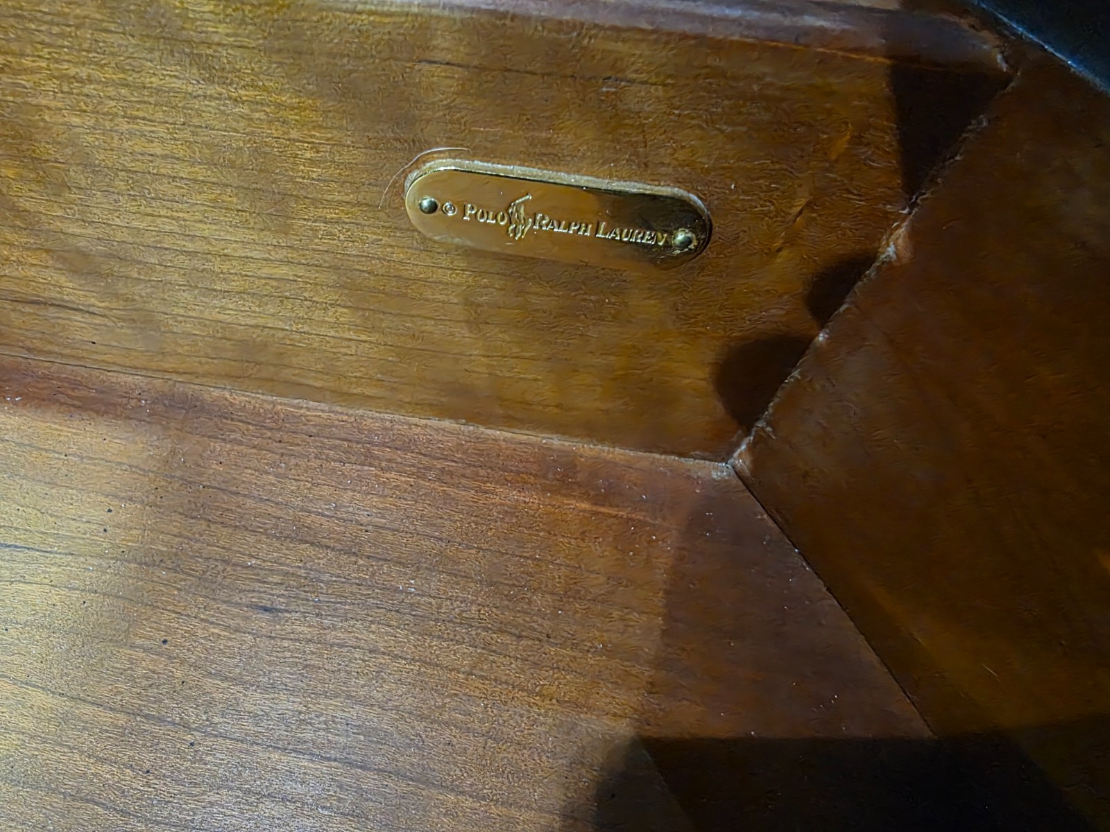 Polo Ralph Lauren Coffee Table dark wood finish oval shape.
