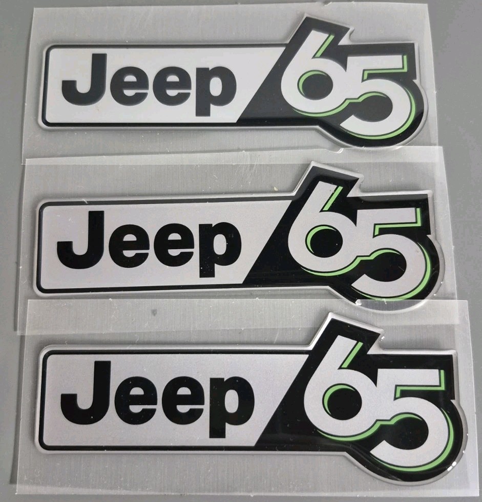 2006 Jeep 65 Anniversary Edition Emblem Nameplate Mopar New OEM.  Set Of 3 😁 