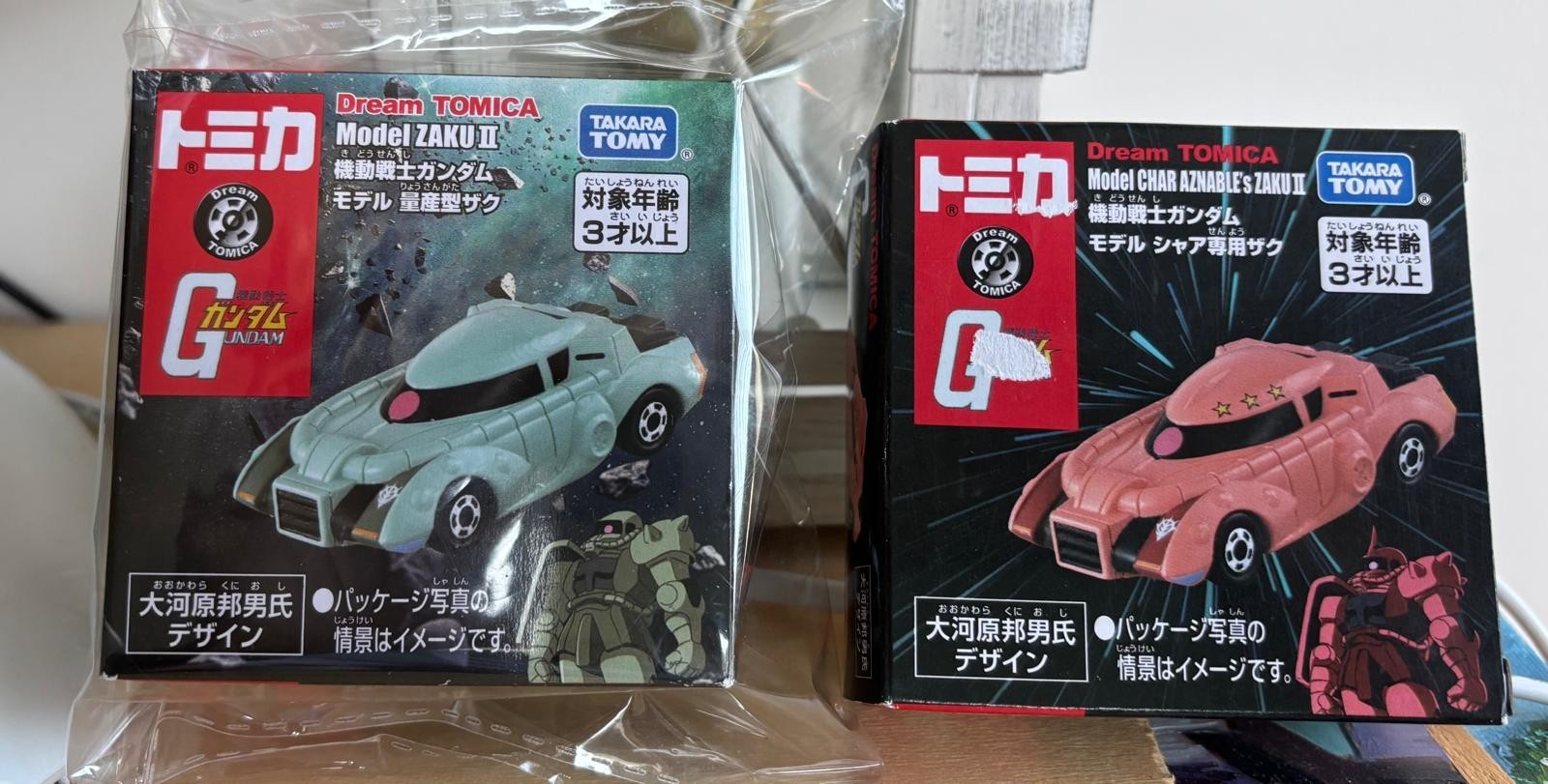 Tomica Mobile Suit Gundam. 2 Models: Char Aznable\'s Zaku II and Zaku II Tomica Mobile Suit Gundam. 2 Models: Char Aznable\'s Zaku II and Zaku II
