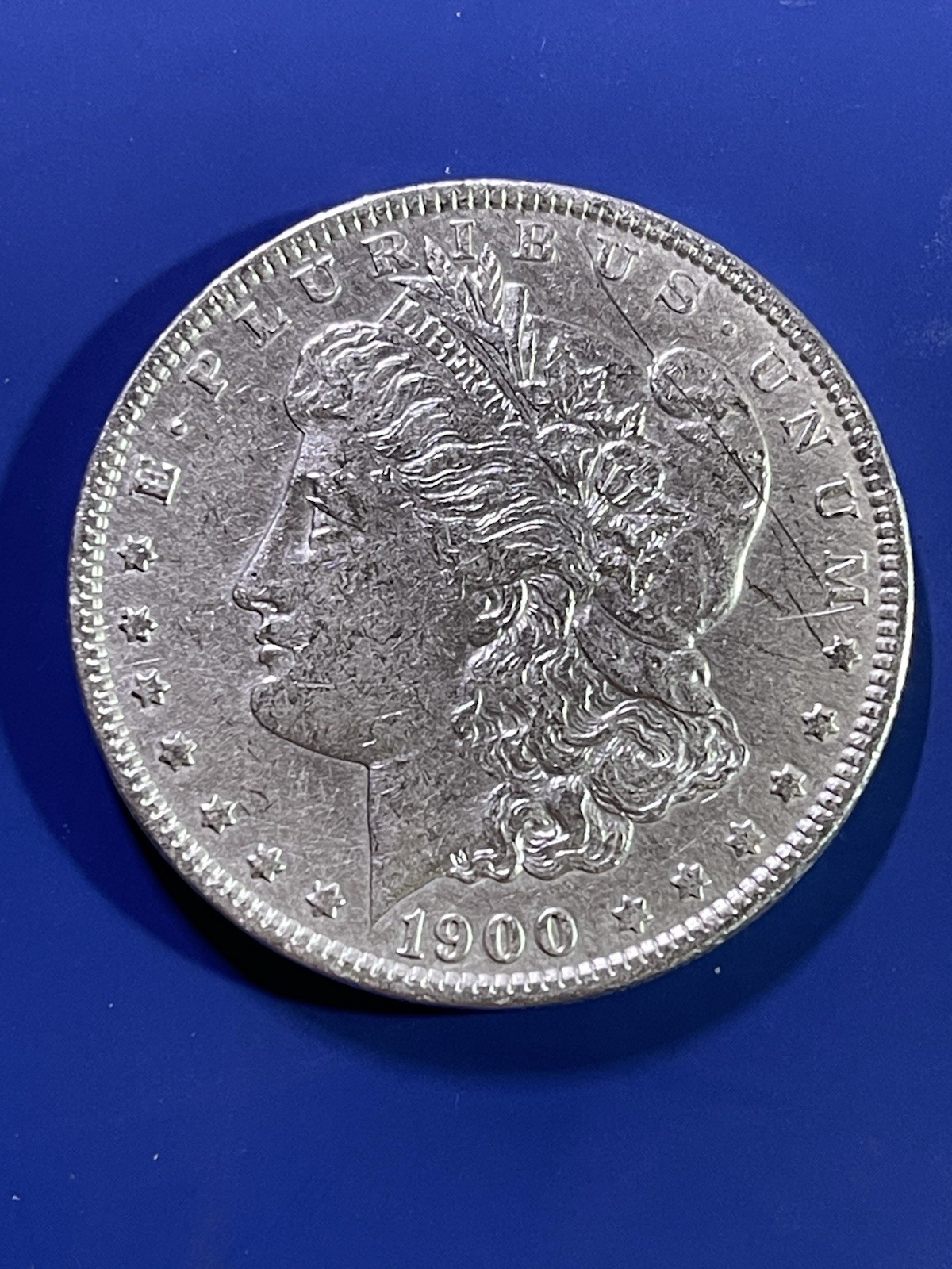 1900-O $1 Morgan Silver Dollar. 90% Silver. #2076