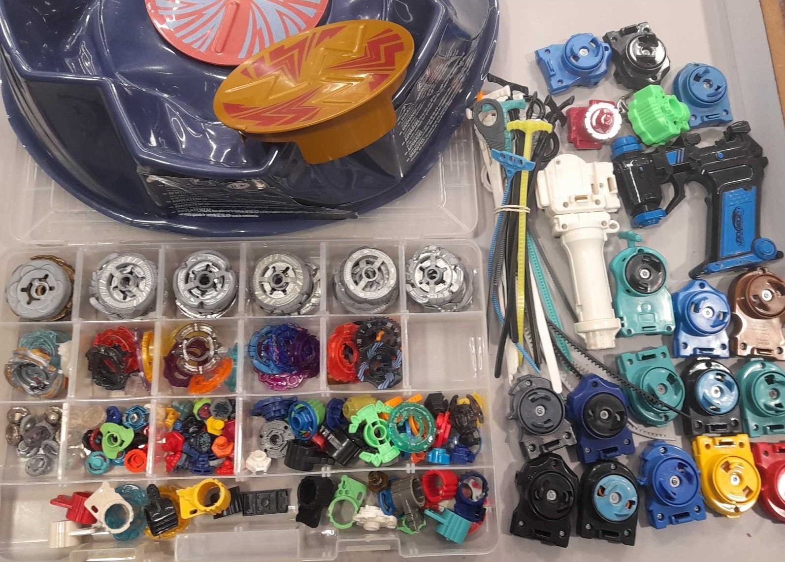huge beyblade lot with parts launchers and stadium