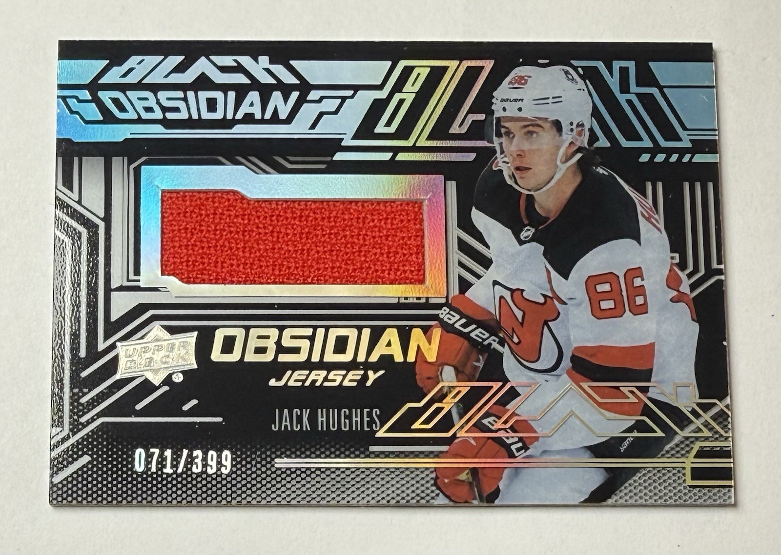 2022-23 SPx UD Black Obsidian GU Jersey Card #’d /399 Jack Hughes #OJ-JH Devils 2022-23 SPx UD Black Obsidian GU Jersey Card #’d /399 Jack Hughes #OJ-JH Devils