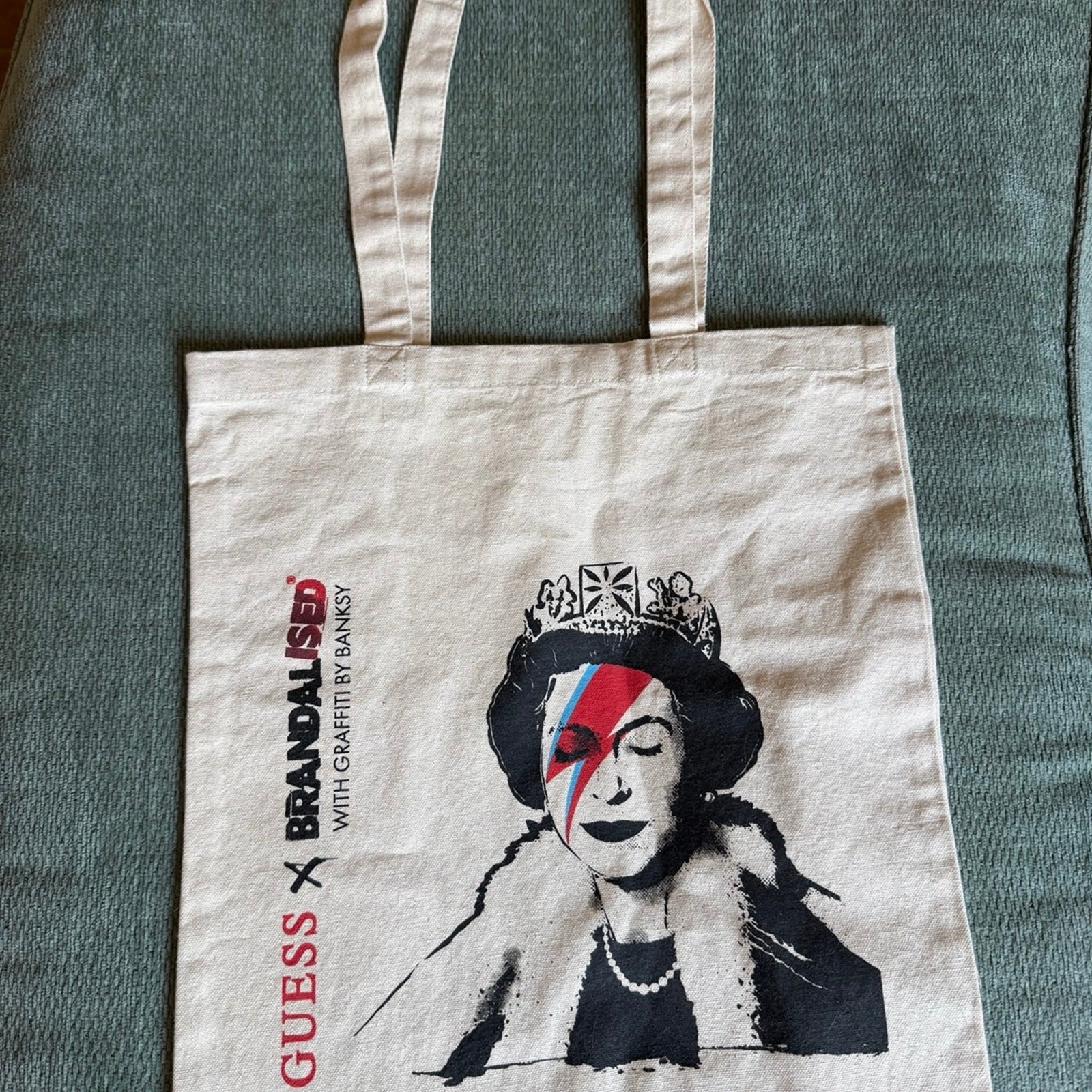 GUESS X BRANDALISED WITH GRAFFITI BY BANKSY BAG GUESS X BRANDALISED WITH GRAFFITI BY BANKSY BAG