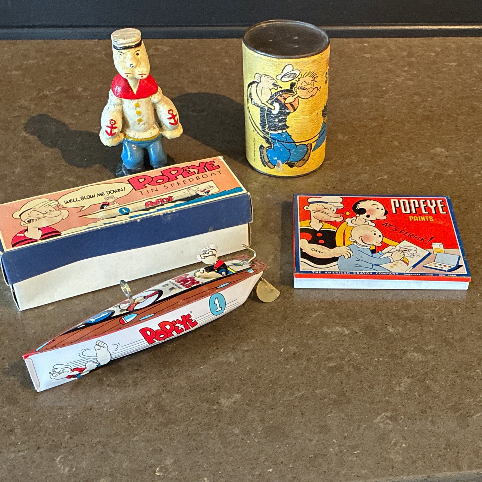 Vintage Popeye Bank, Tin Speedboat, Spinach Can, and Paints Tin