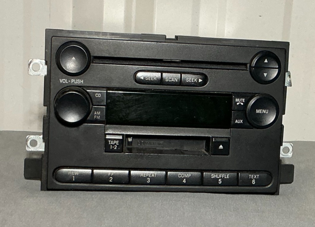 Ford OEM AM FM Radio CD Cassette Player Aux Input Part 4L3T-18C868-FE Ford OEM AM FM Radio CD Cassette Player Aux Input Part 4L3T-18C868-FE