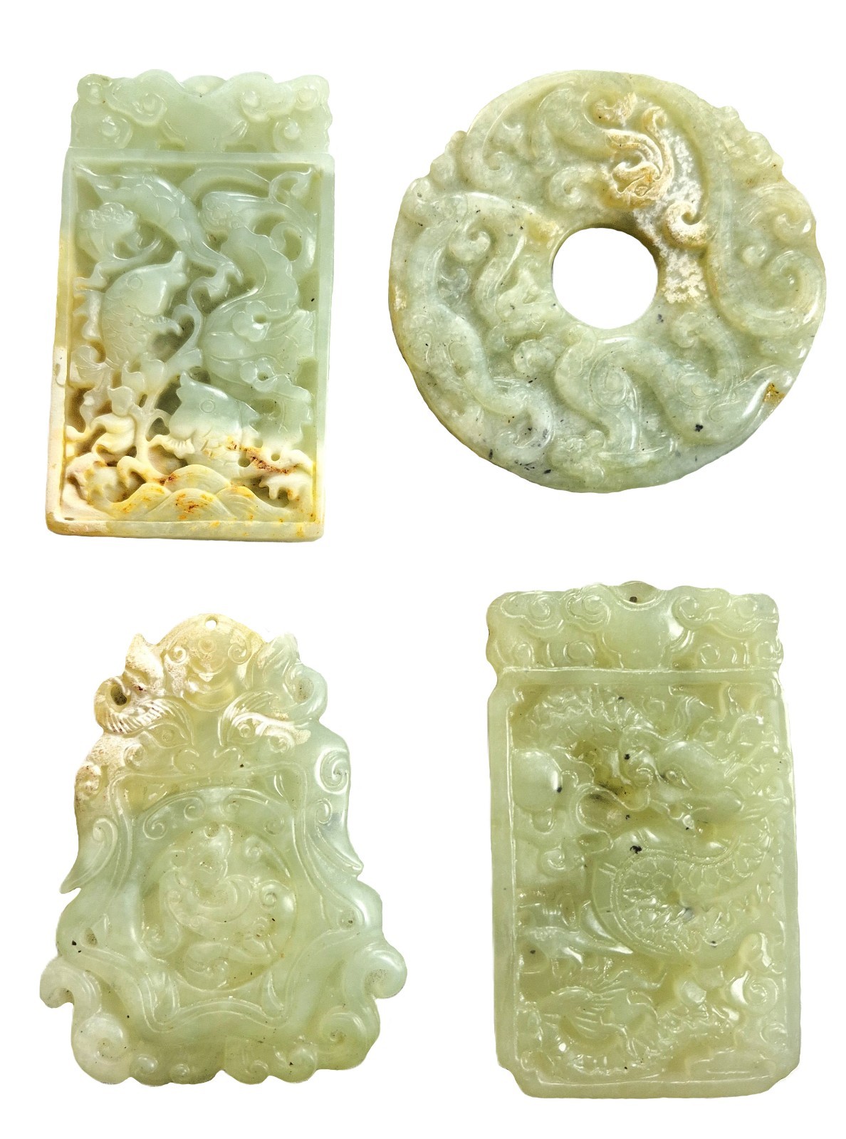 Collection of Four Fengshui Chinese Carved Jade Amulet Pendants Collection of Four Fengshui Chinese Carved Jade Amulet Pendants