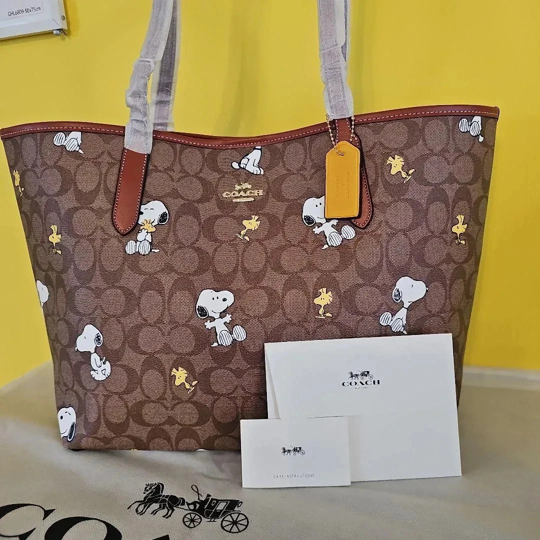 NWT Coach CF166 City Tote Bag Signature Coated Canvas Snoopy Print New Outlet